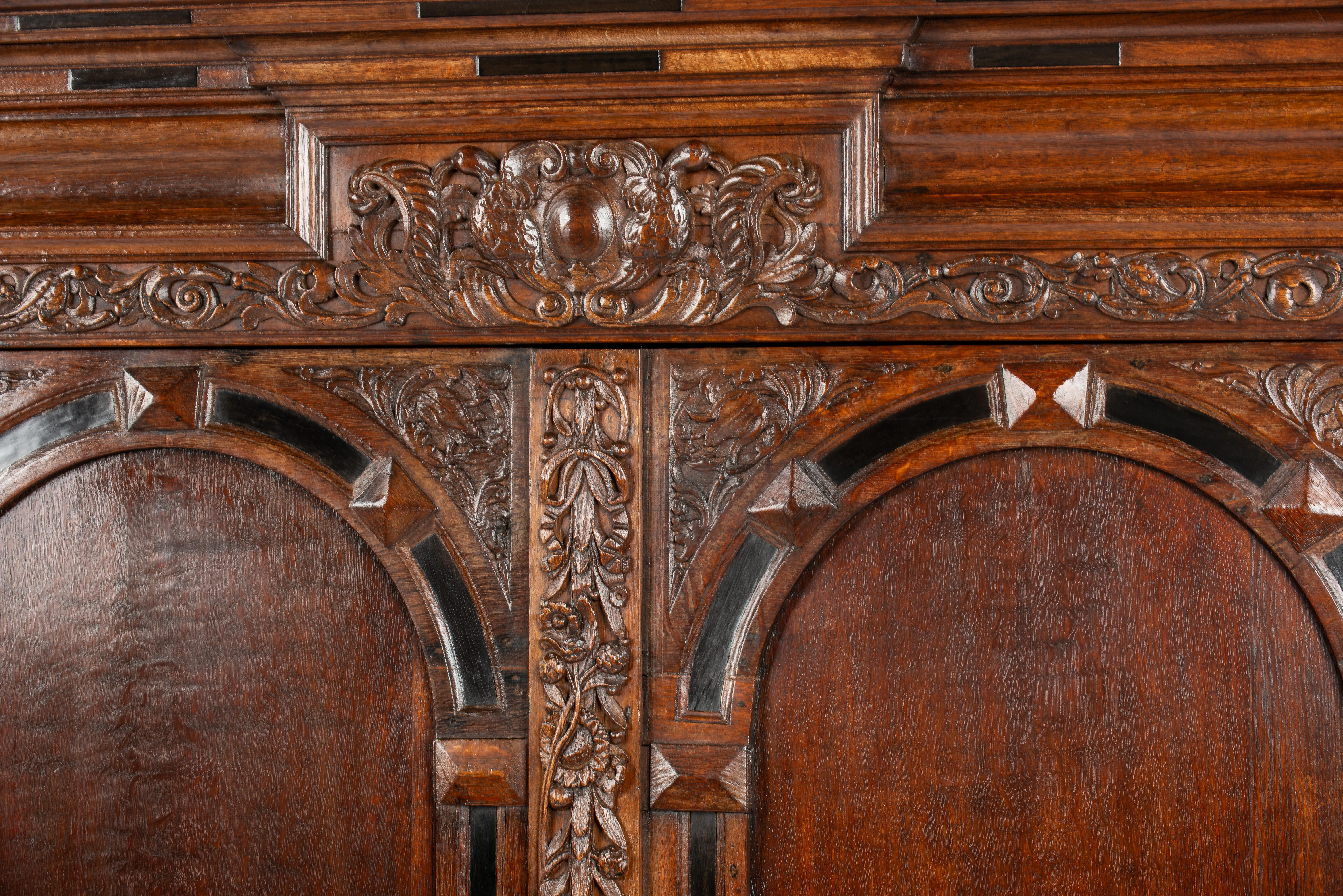 +17th century Dutch renaissance two door portal cabinet with exotic carvings For Sale 1