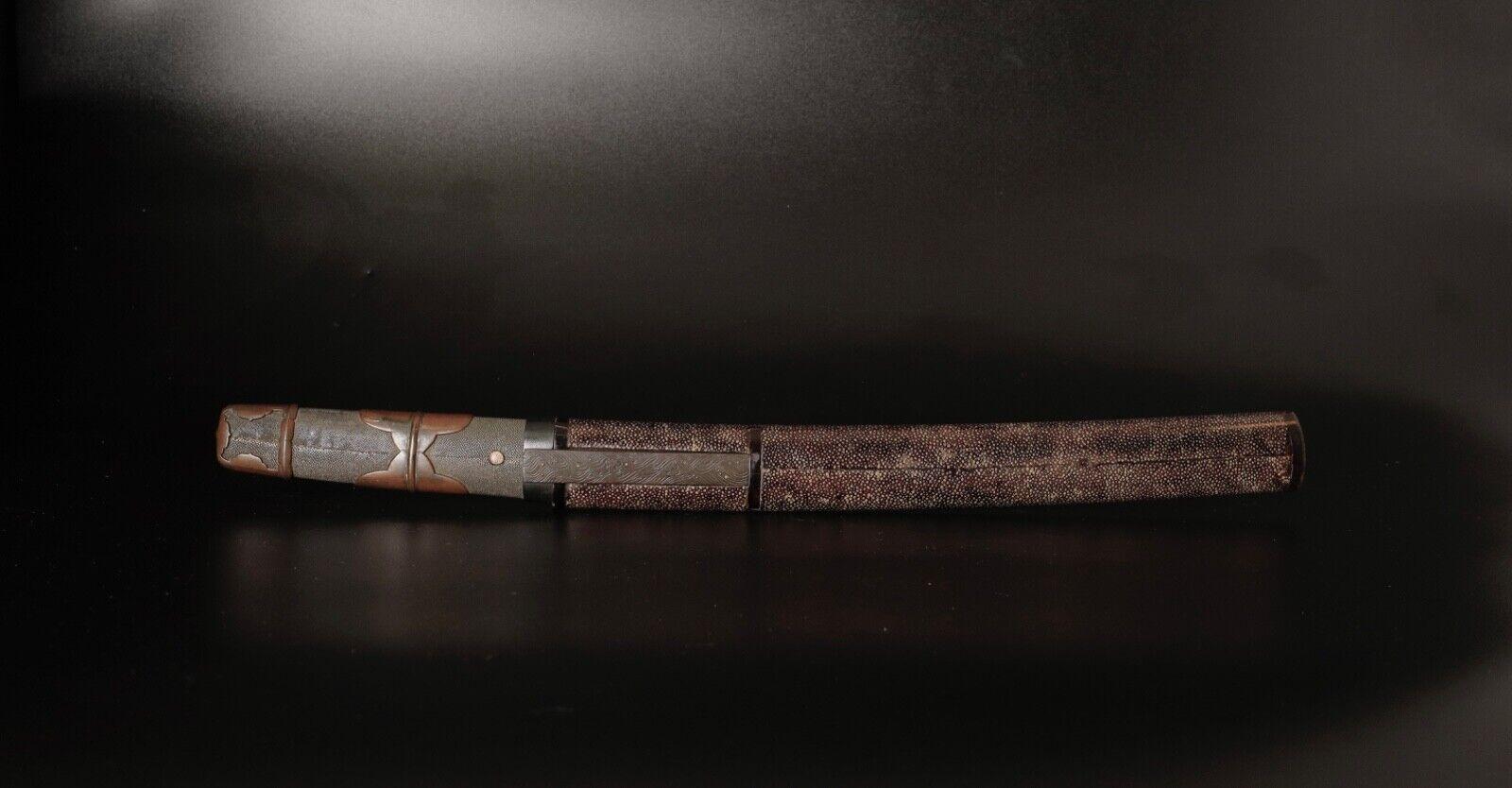A remarkable piece of Japanese history, a Fine Wakizashi Samurai short sword scabbard (no blade) . This exceptional piece , hails from the illustrious Edo period, specifically the 17th to 18th century.

Crafted with meticulous attention to detail,