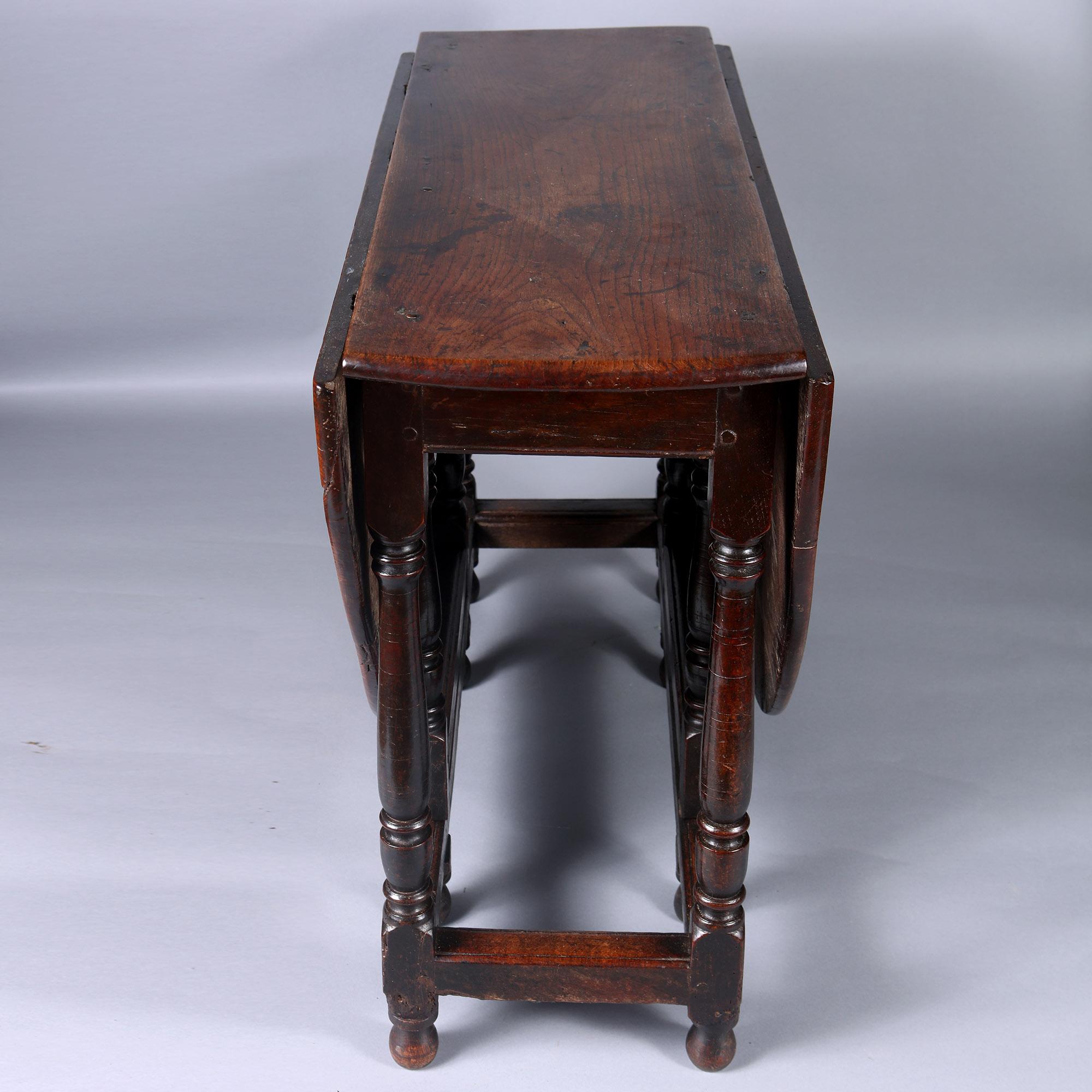 18th Century and Earlier 17TH Century Elm and Oak Drop Leaf Table For Sale