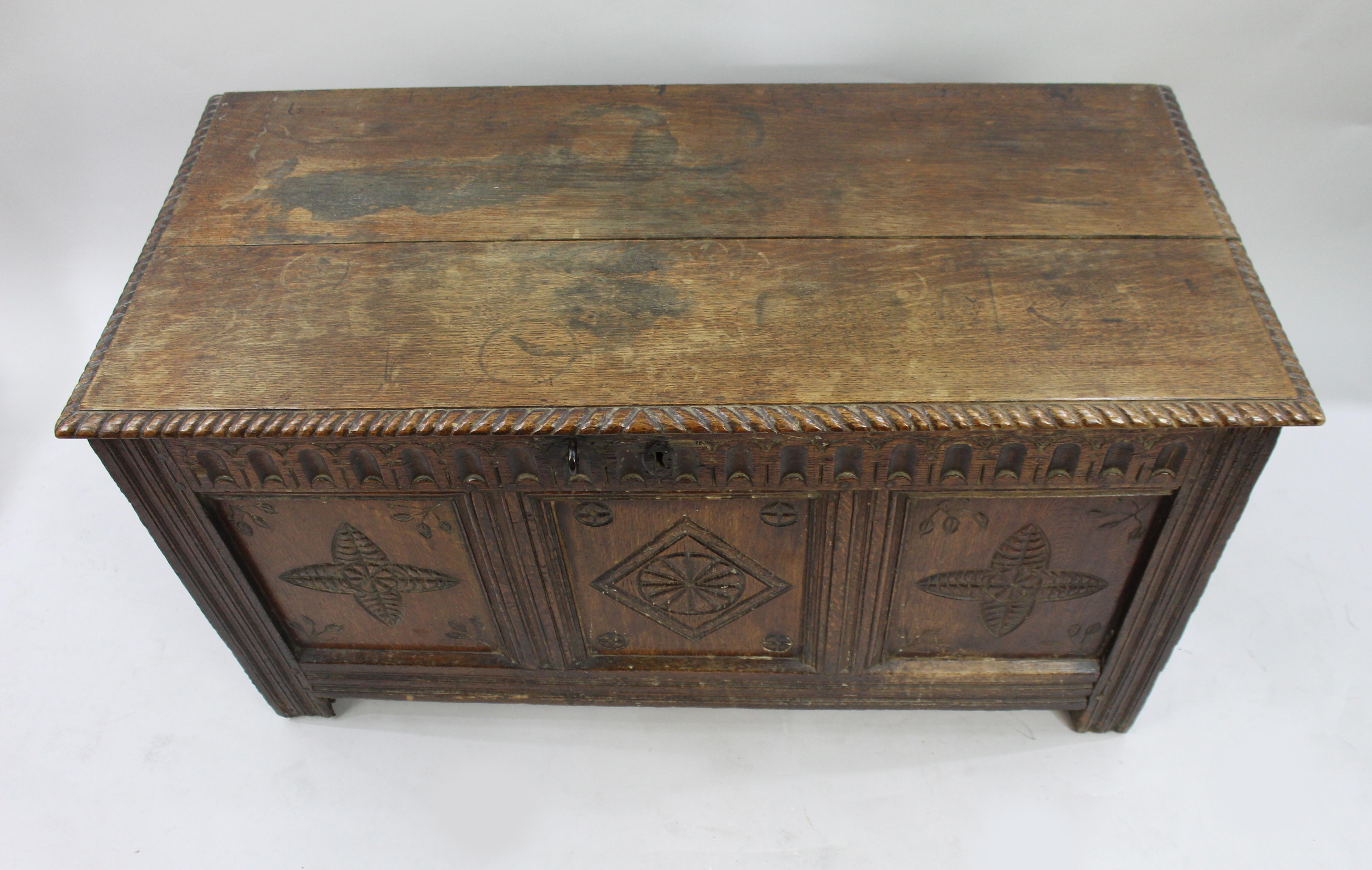 British 17th Century English Carved Oak Coffer with Foliate and Lozenge Panels For Sale