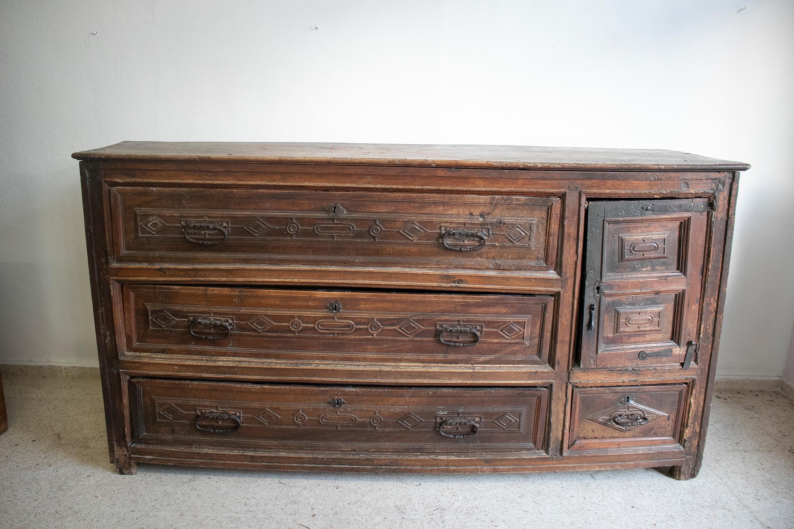 Antique 16th Century English drawer chest with original iron fittings.