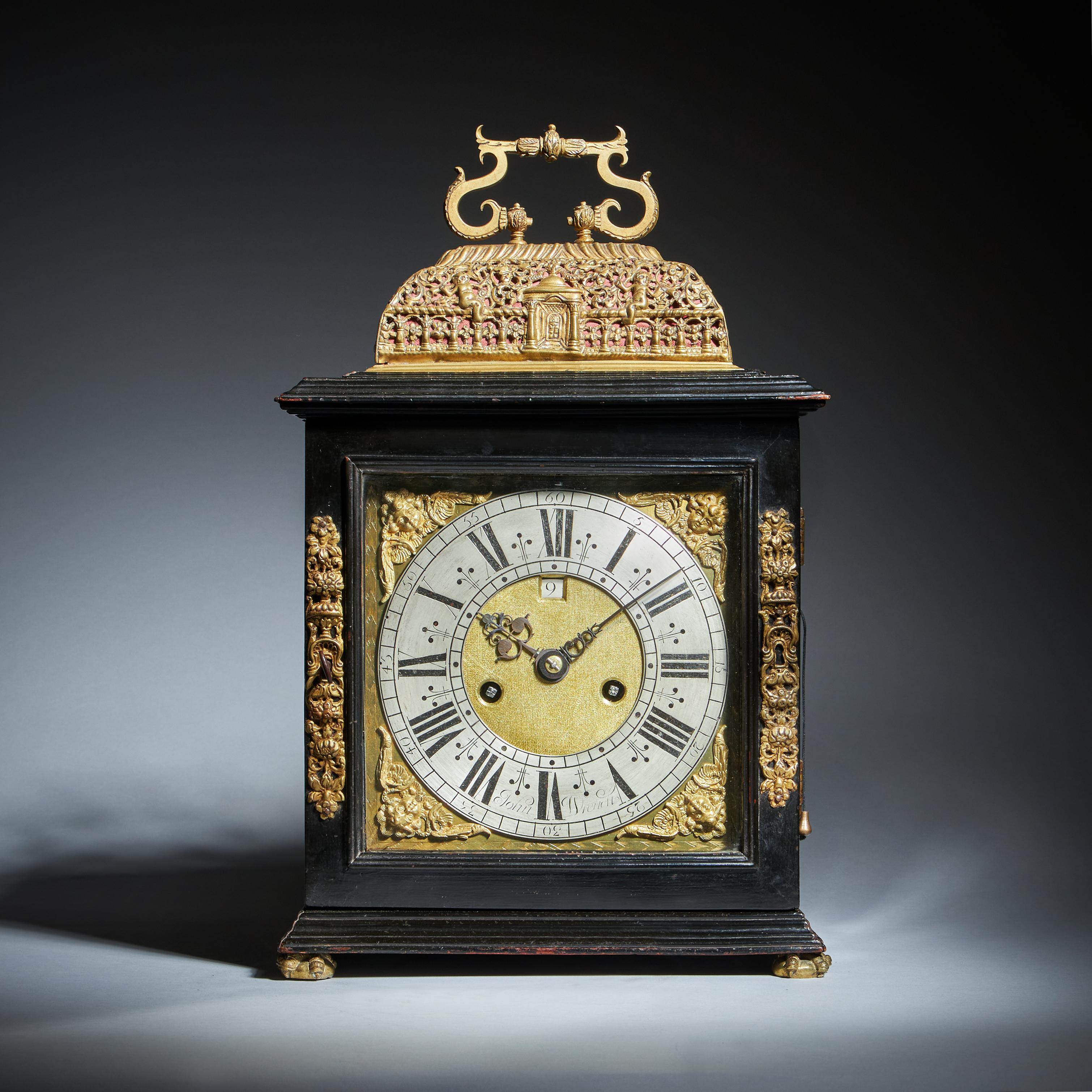 A Rare Late 17th Century English Basket-Top Spring Clock by John Wrench of Chester, Circa 1695-1700. England

This exquisite late 17th-century English basket-top table clock, signed by John Wrench of Chester, showcases the elegance and craftsmanship