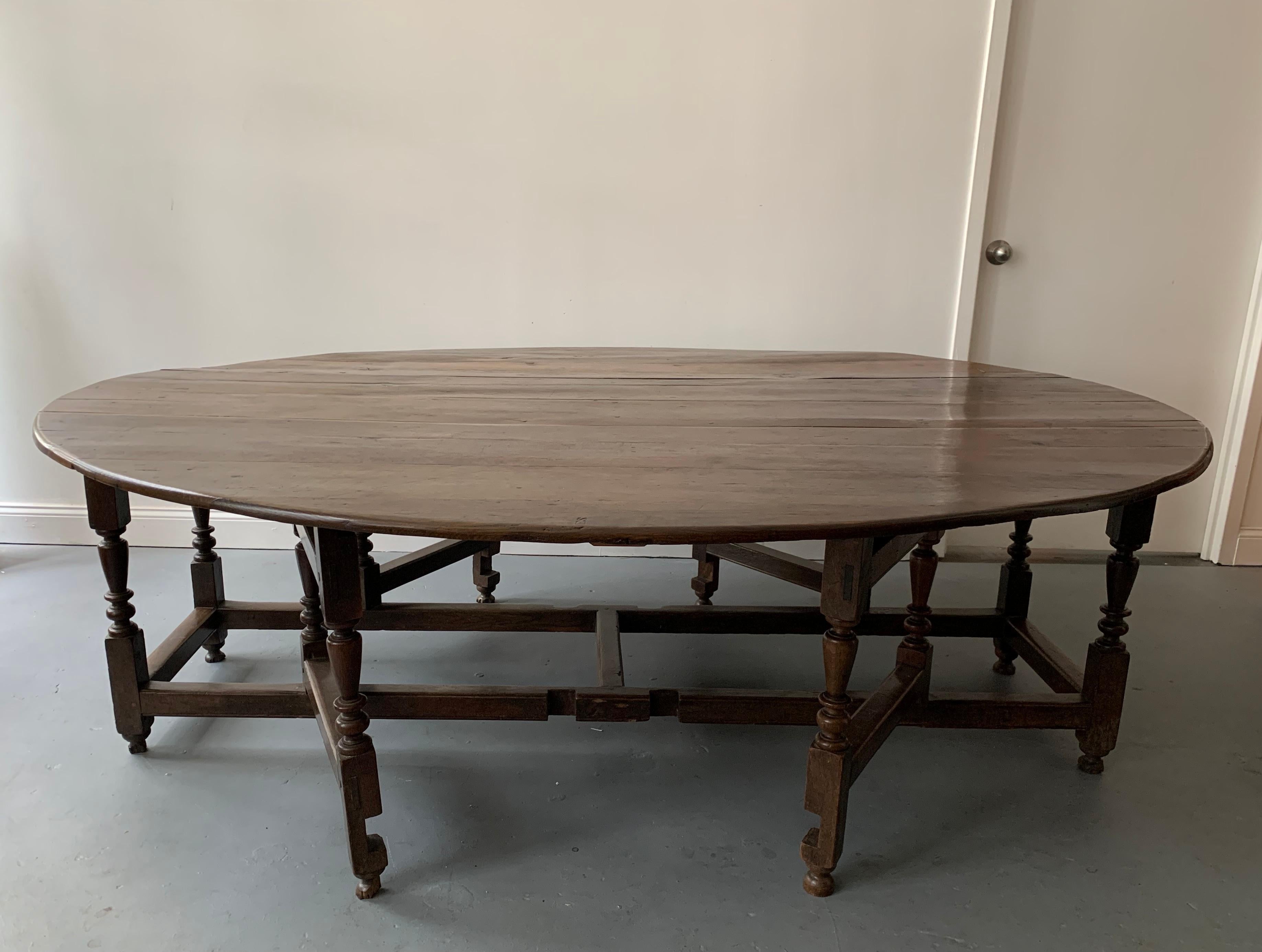 A very large dining table from 1680. The table has been restored and needs only to be re-waxed upon sale. The gate-leg table has a wonderful patina to its surface.