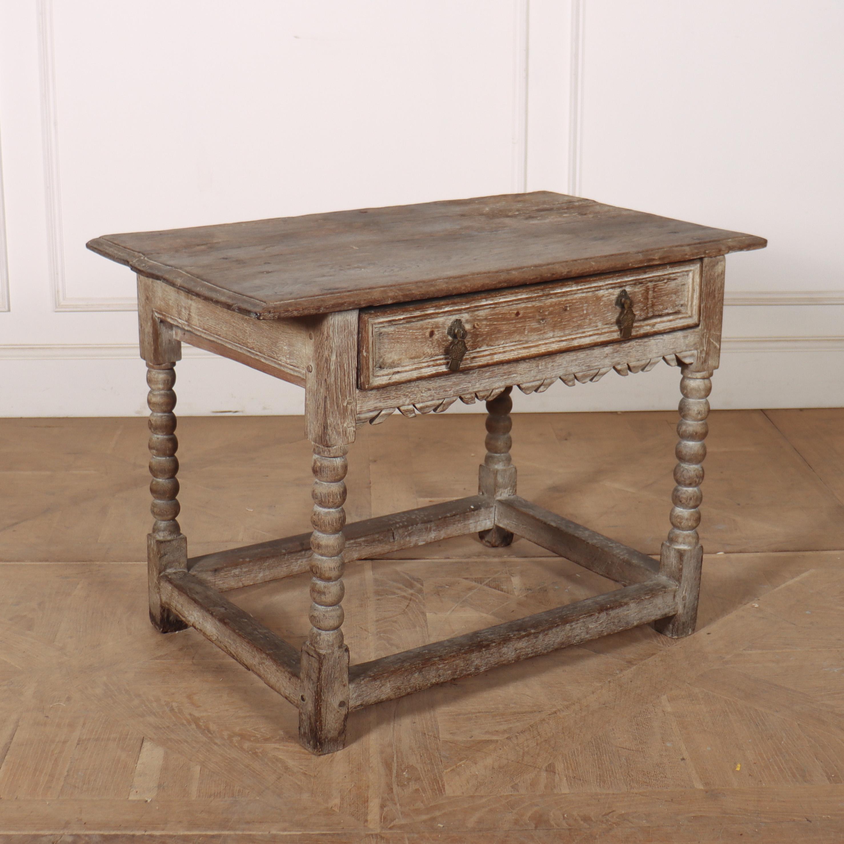 17th C English limed oak one drawer lamp / side table. 1690.

Reference: 8247

Dimensions
35.5 inches (90 cms) Wide
21 inches (53 cms) Deep
25 inches (64 cms) High
