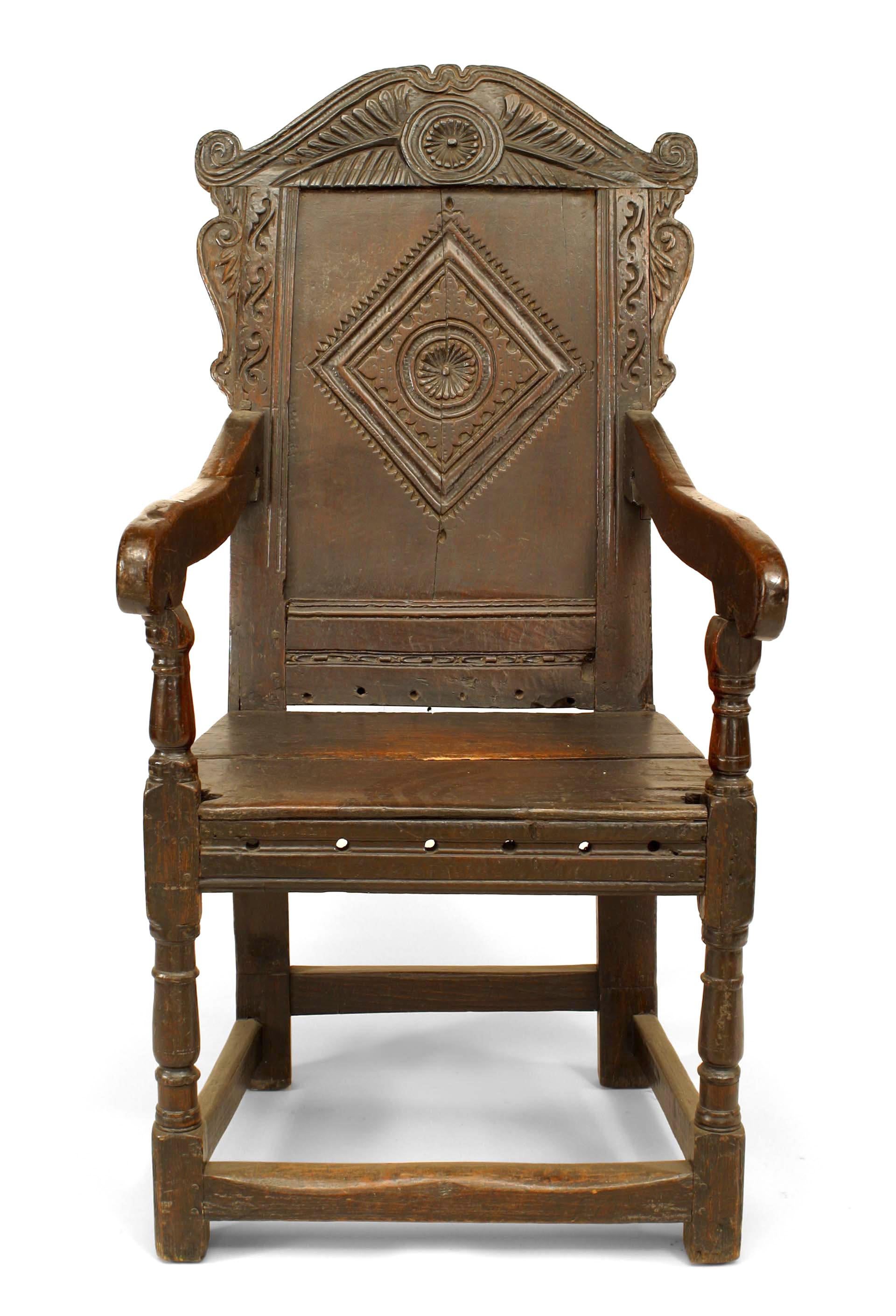 English Renaissance (17th Cent) Wainscot style oak arm chair with diamond designed carved back. (rePairs to back)

