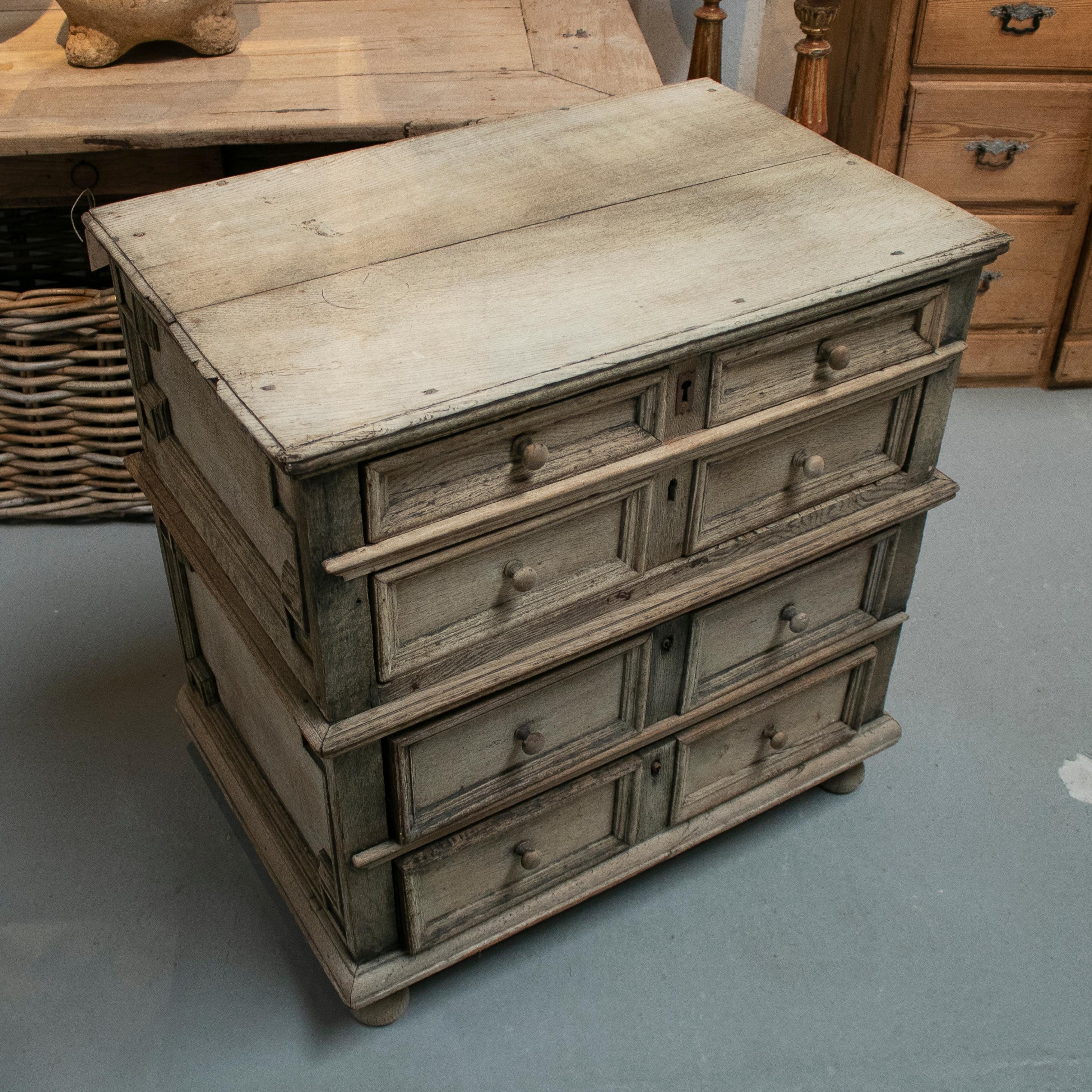 Antique 17th century English two part wooden chest of drawers in natural wood finish.
   