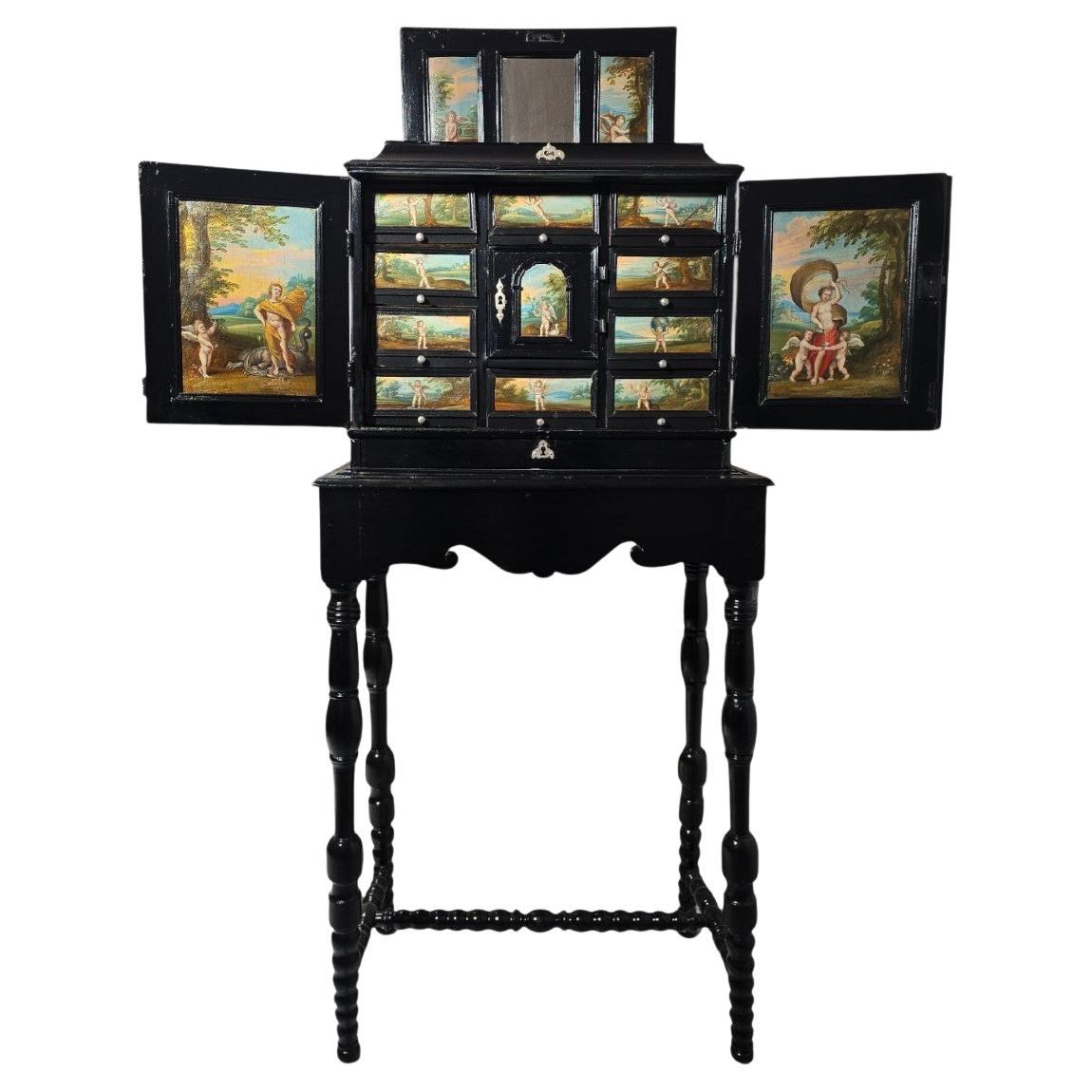 Armadio fiammingo del XVII secolo con dipinti mitologici e decorazioni in argento