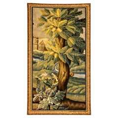 Arazzo figurato fiammingo del XVII secolo con albero da frutta e uccelli