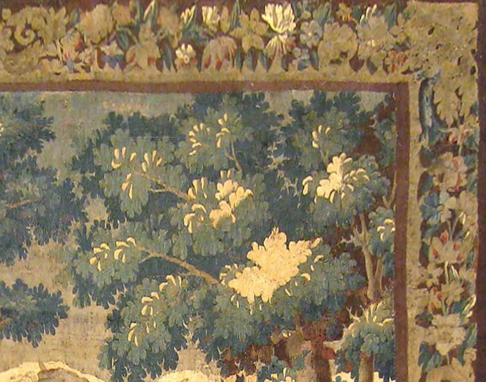 18th Century and Earlier 17th Century Flemish Rustic Verdure Tapestry, with Youths at Play in the Woods For Sale