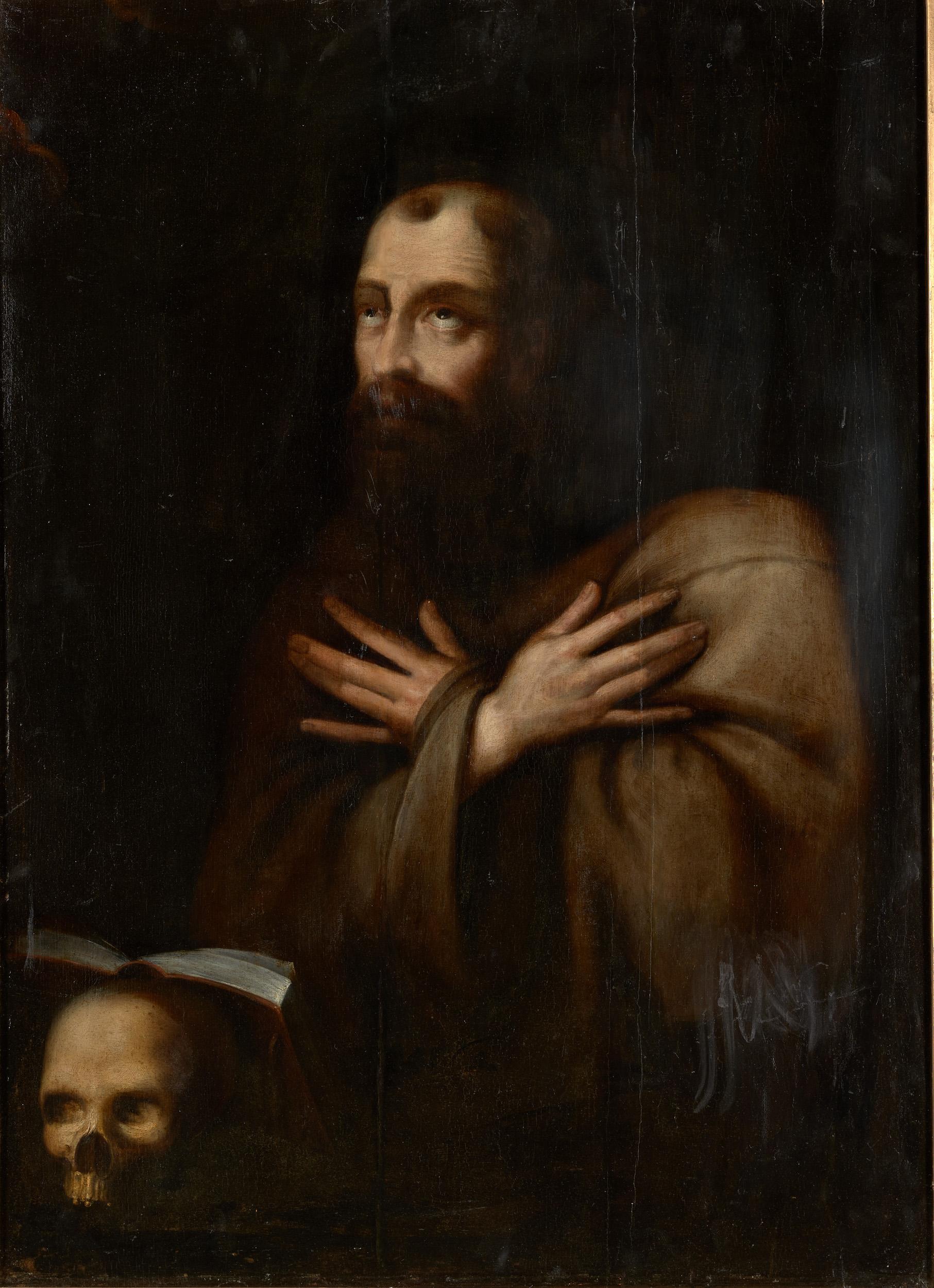 This 17th century panel painting is a depiction of a praying Franciscan monk, or of Saint Francis. The grey-brown habit, the skull and the book are the iconographical elements that identify the monk as Franciscan, or as Saint Francis in prayer. The