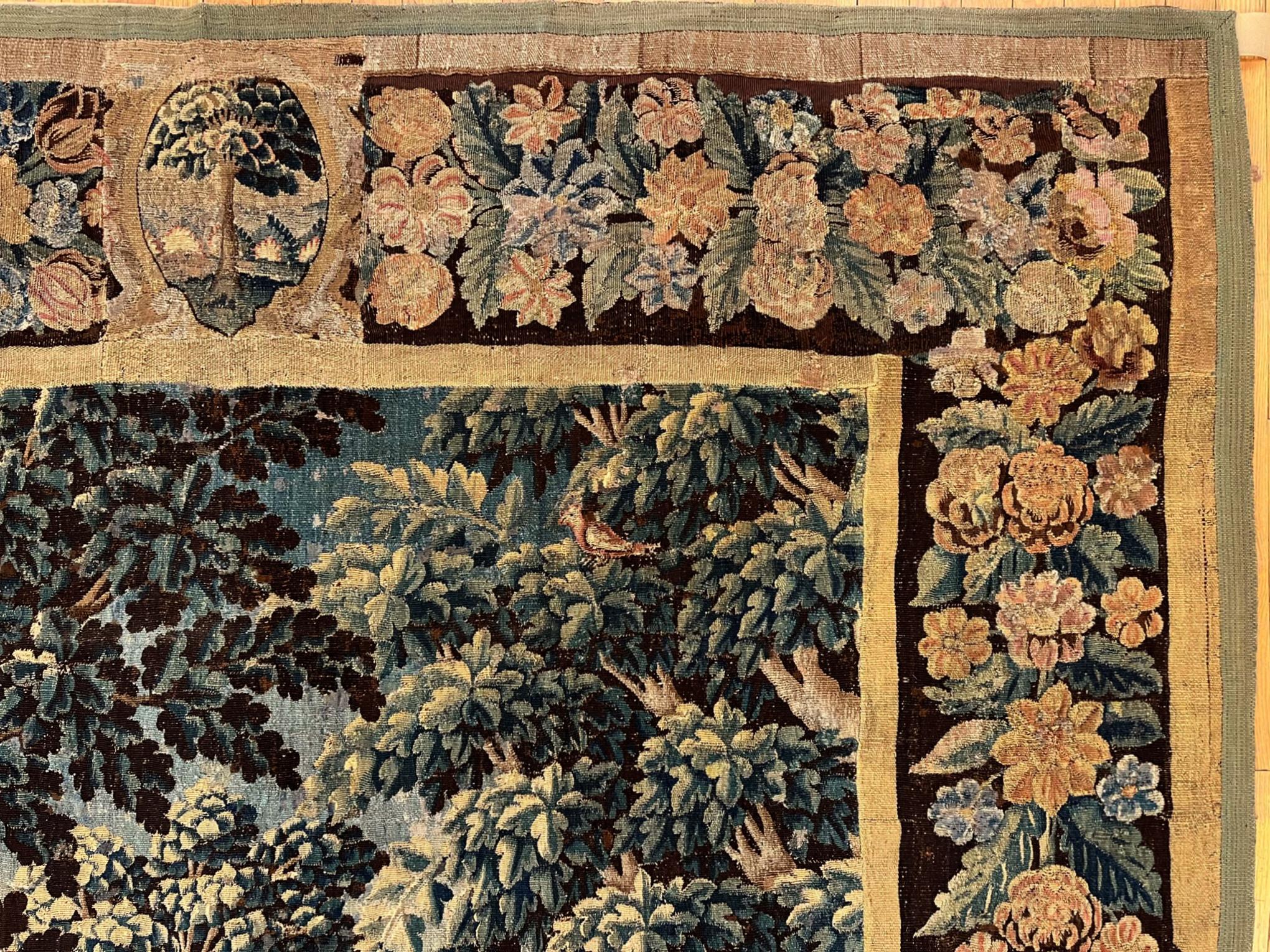 17th Century Flemish Verdure Landscape Tapestry, a Lush Forest & Pendant Border For Sale 4