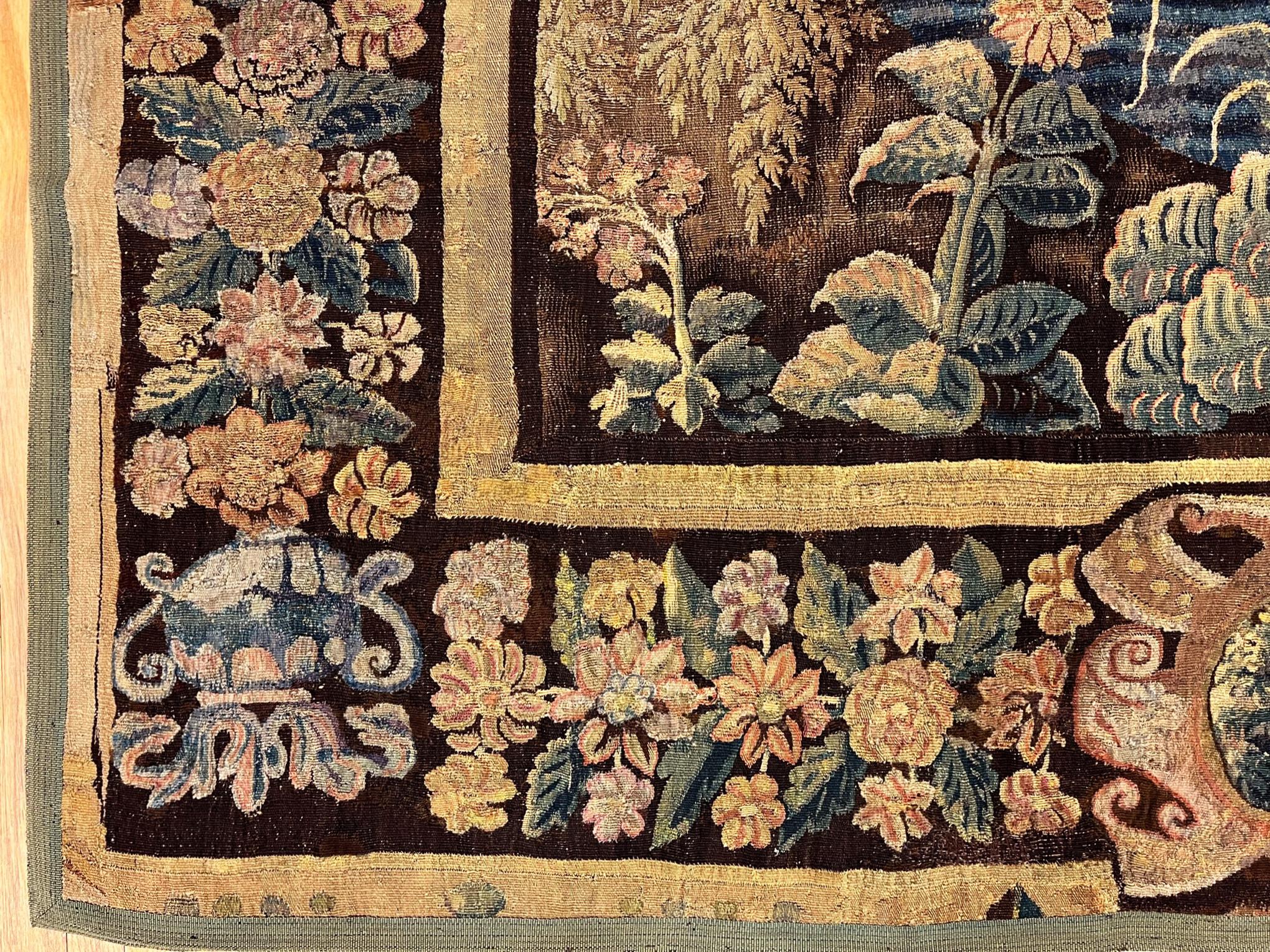 European 17th Century Flemish Verdure Landscape Tapestry, a Lush Forest & Pendant Border