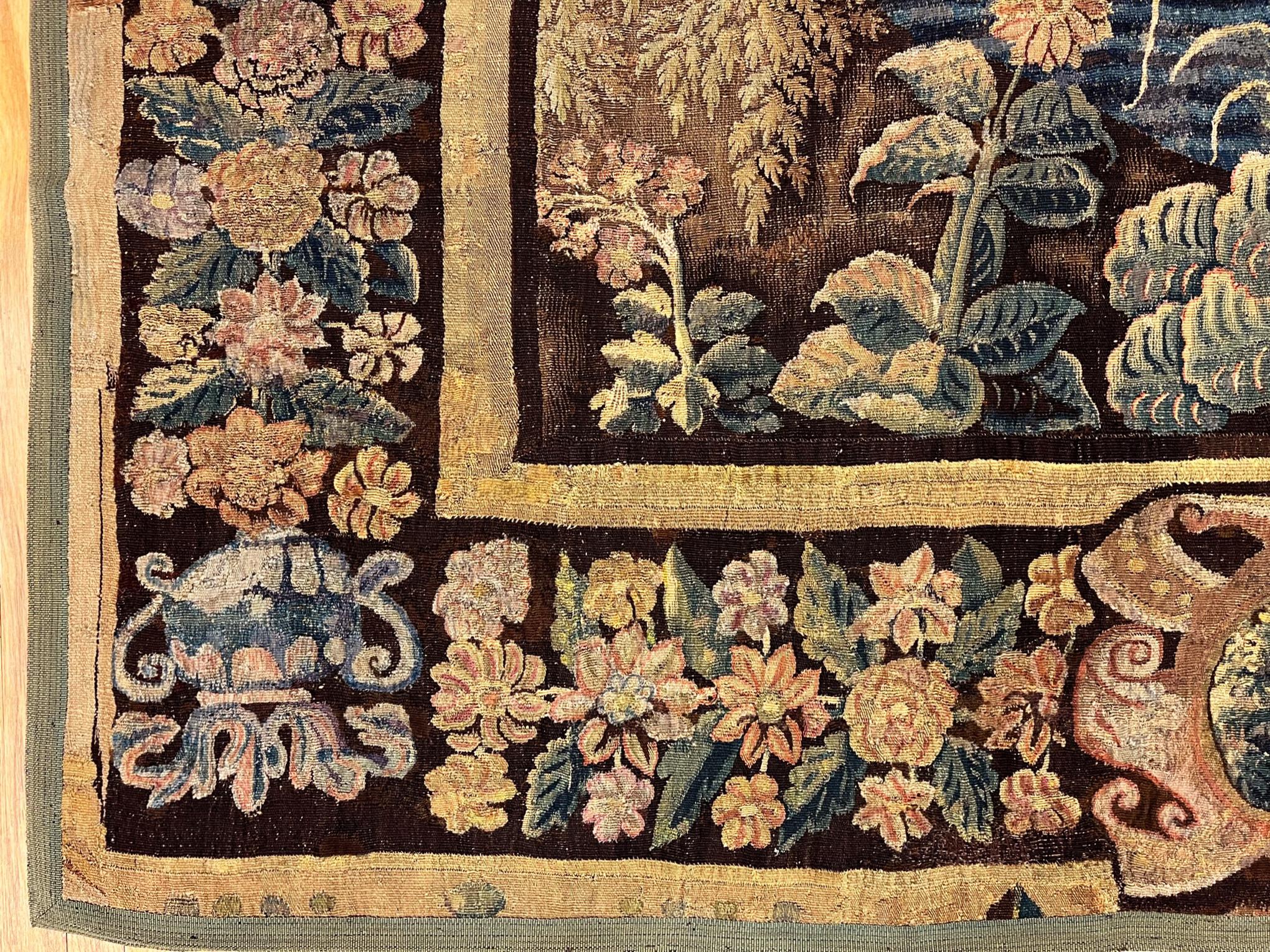 European 17th Century Flemish Verdure Landscape Tapestry, a Lush Forest & Pendant Border For Sale