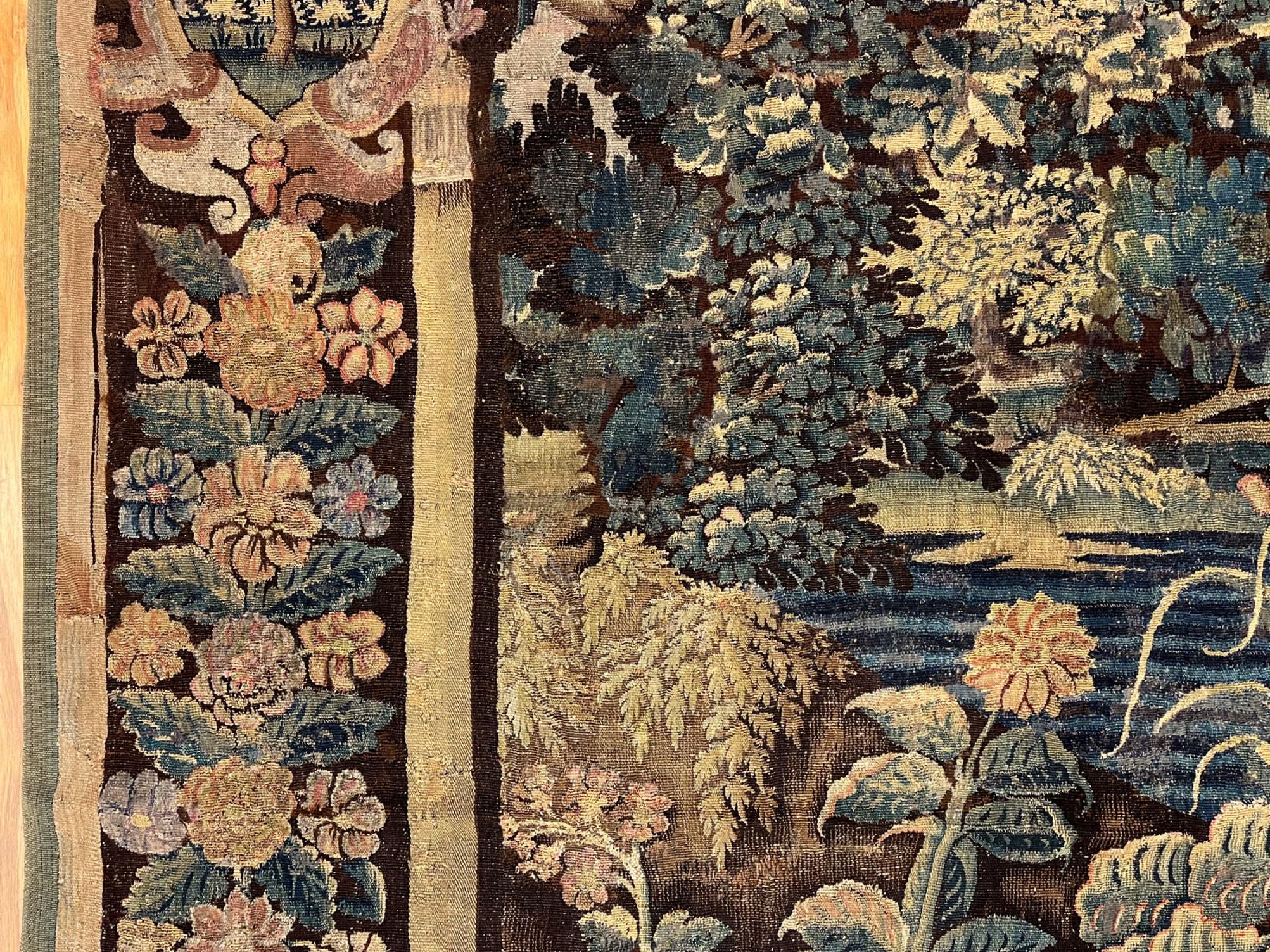 17th Century Flemish Verdure Landscape Tapestry, a Lush Forest & Pendant Border In Good Condition For Sale In New York, NY