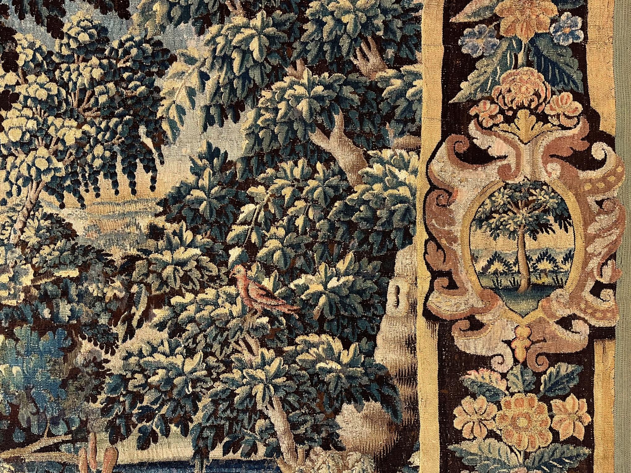 17th Century Flemish Verdure Landscape Tapestry, a Lush Forest & Pendant Border For Sale 2