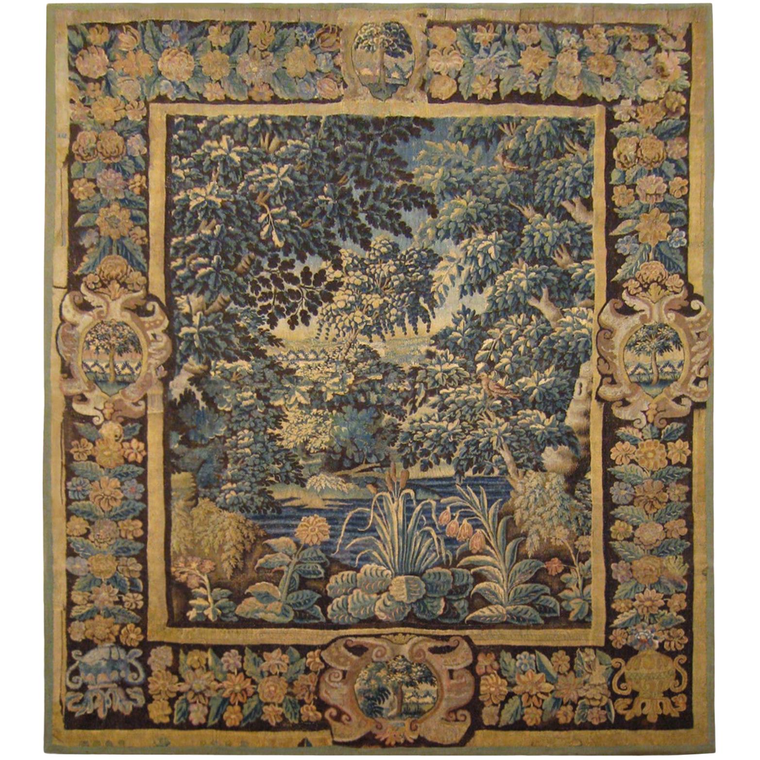 Flemish Verdure Landscape Tapestry aus dem 17. Jahrhundert, eine üppige Wald- und Pendelbordüre