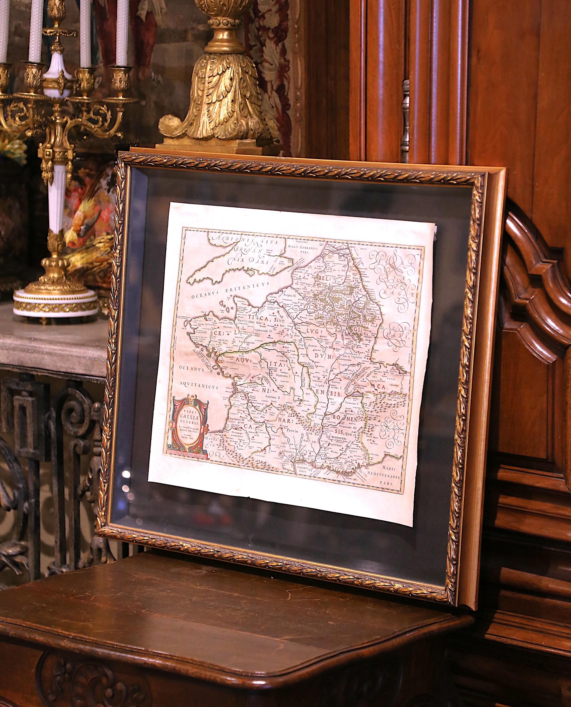 Decorate an office or a library with this elegant historic map. Crafted in the Netherlands circa 1630, this beautifully framed antique map with protective glass, titled 