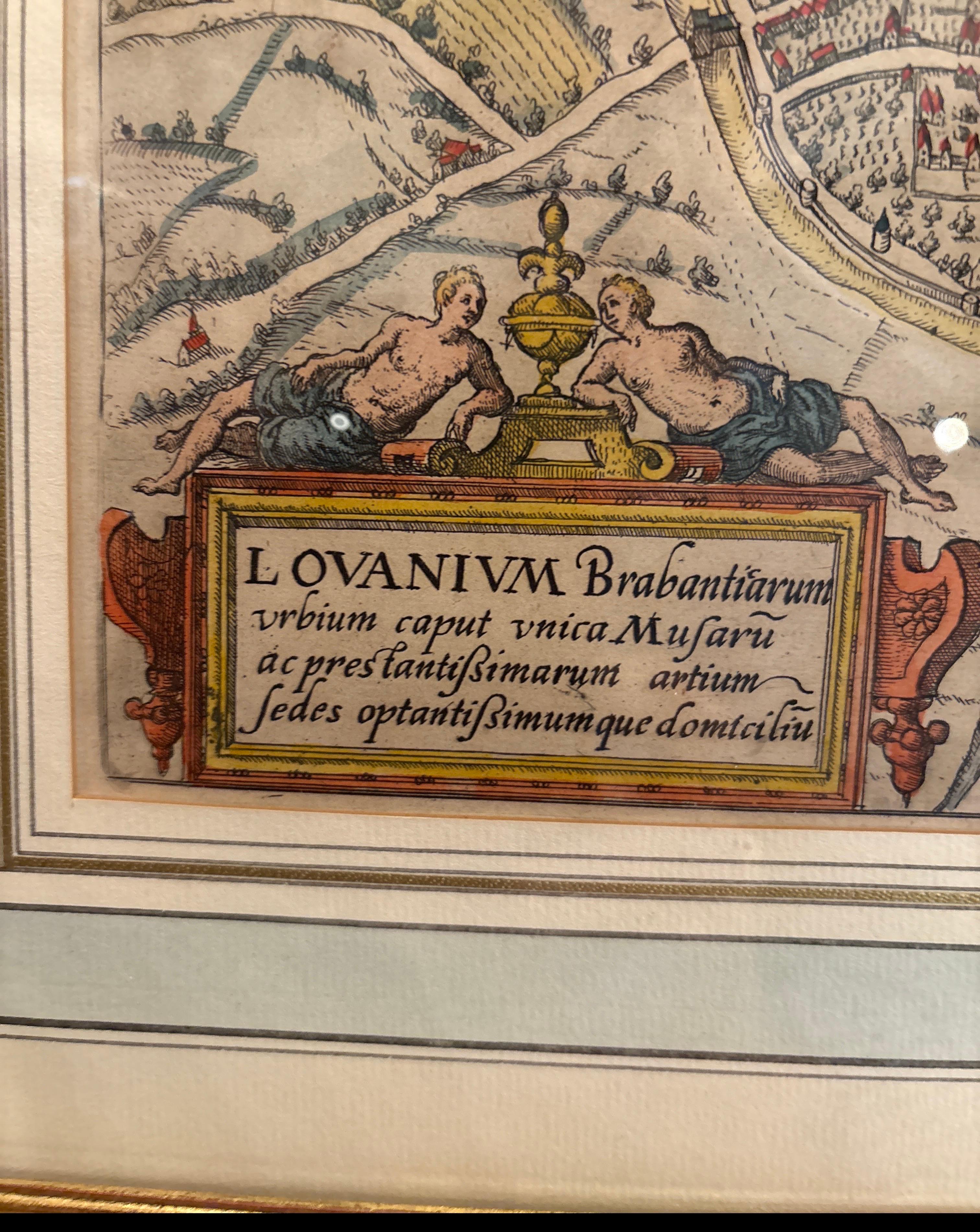 Très ancienne carte de BRUGES en Belgique, colorée à la main par Antonia Sanderus, publiée par Joan Blaeu au début du 20e siècle, avec des cartes détaillées à la main.  17,5 pouces de large, 14,5 pouces de haut dans le cadre 