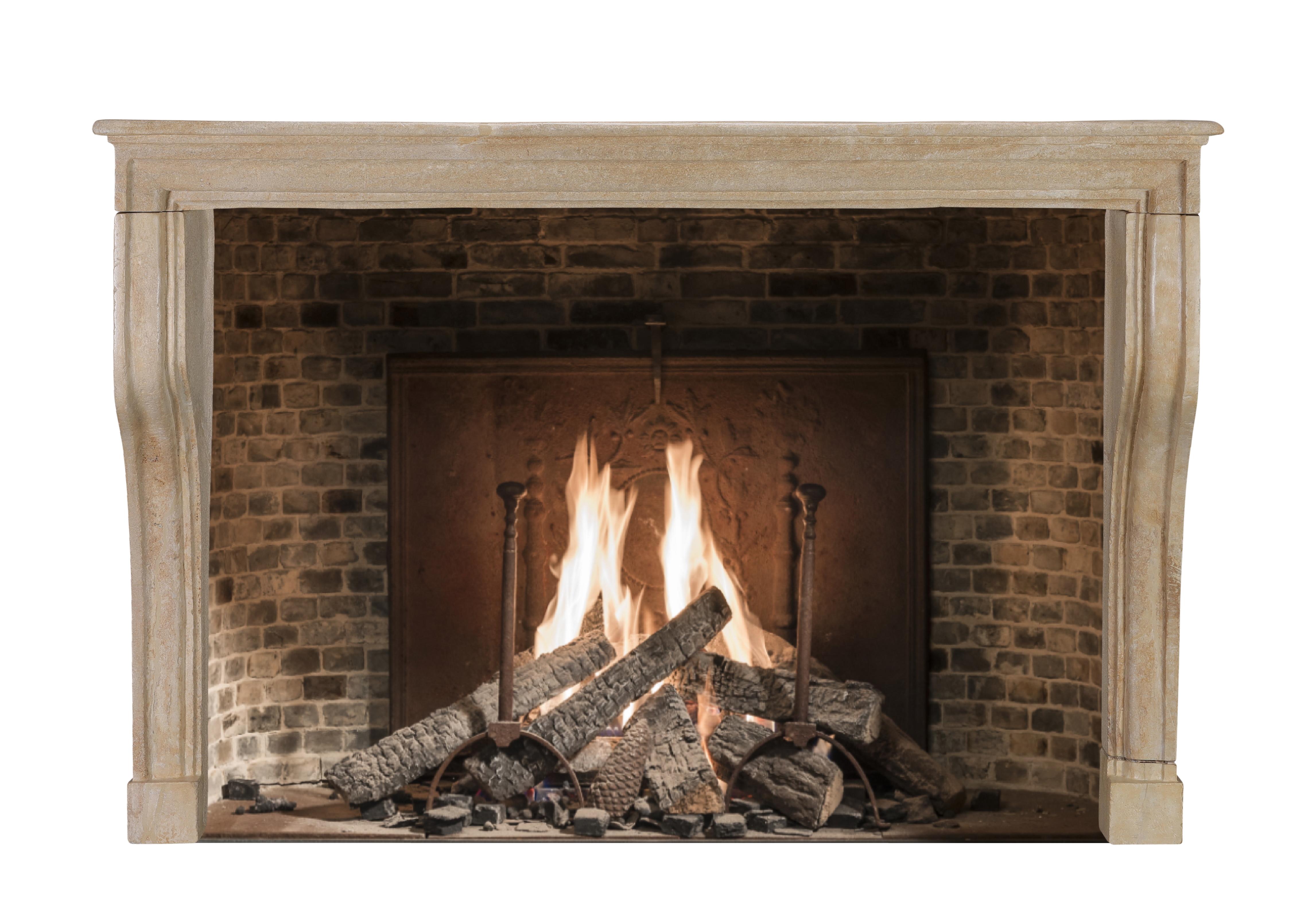 Hand-Carved 17th Century French Alpine Fireplace in Warm Limestone – Timeless Elegance For Sale