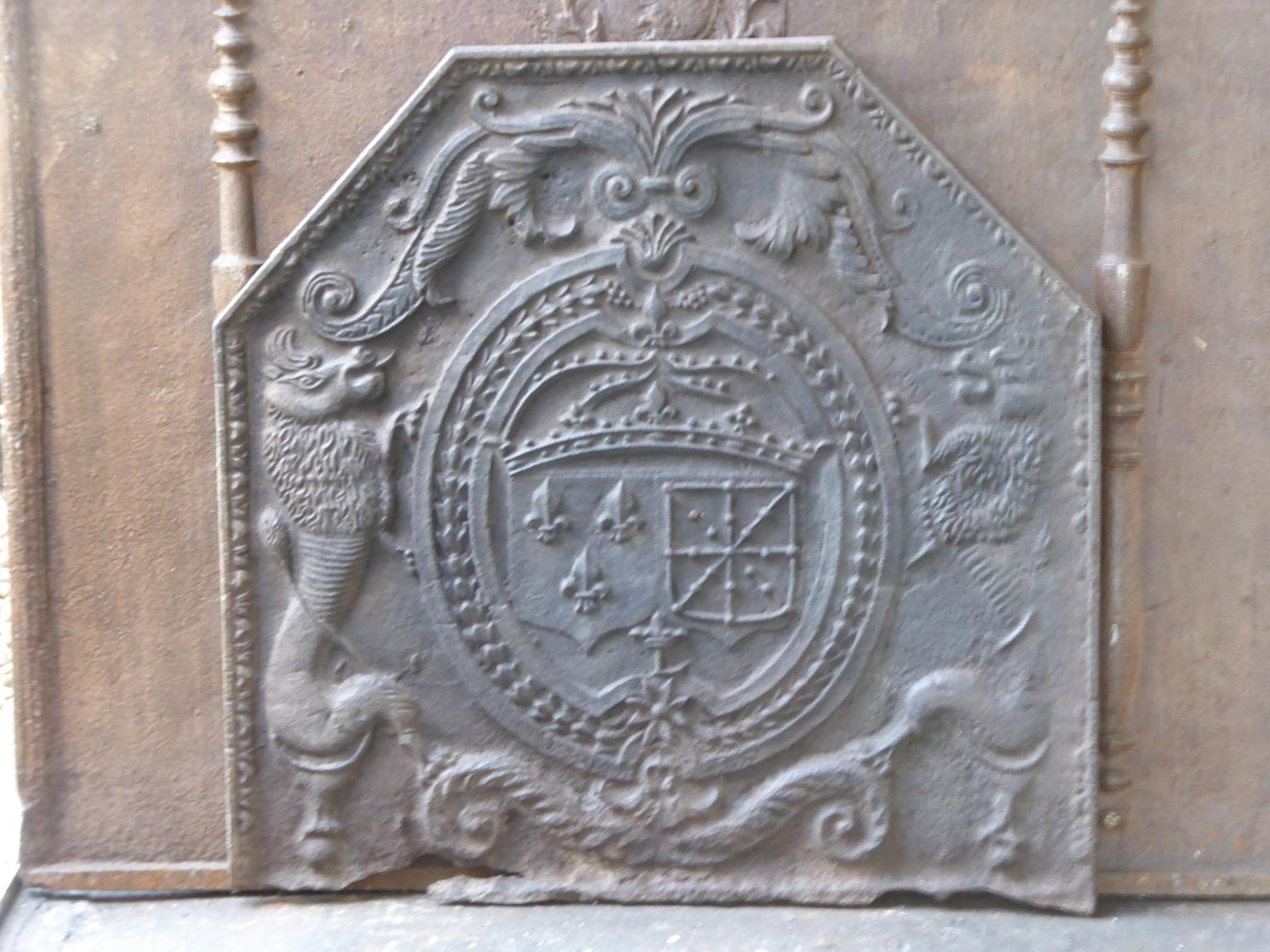 17th century French Louis XIV fireback with the Arms of France and Navarre. 

Arms of the House of Bourbon from France, one of the major royal dynasties of Europe that produced monarchs Spain (Navarre), France, the two Sicilies and Parma. Bourbon