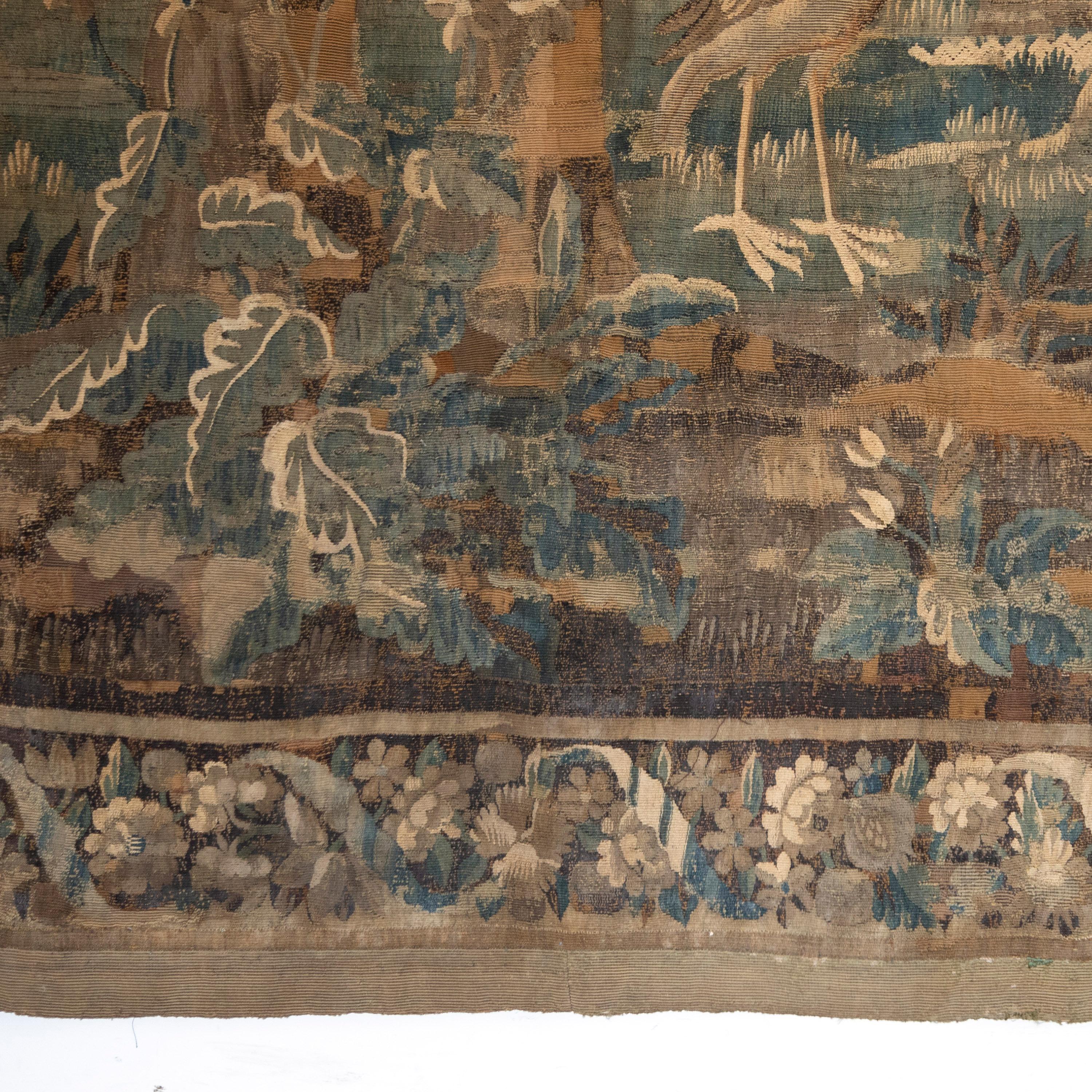 Wonderful 17th Century Aubusson landscape tapestry featuring a paradisiacal vision of a country house and gardens.

Aubusson Verdure tapestries originated from workshops set up between the towns of Clermont- Ferrand, and Limoges in France. 

In