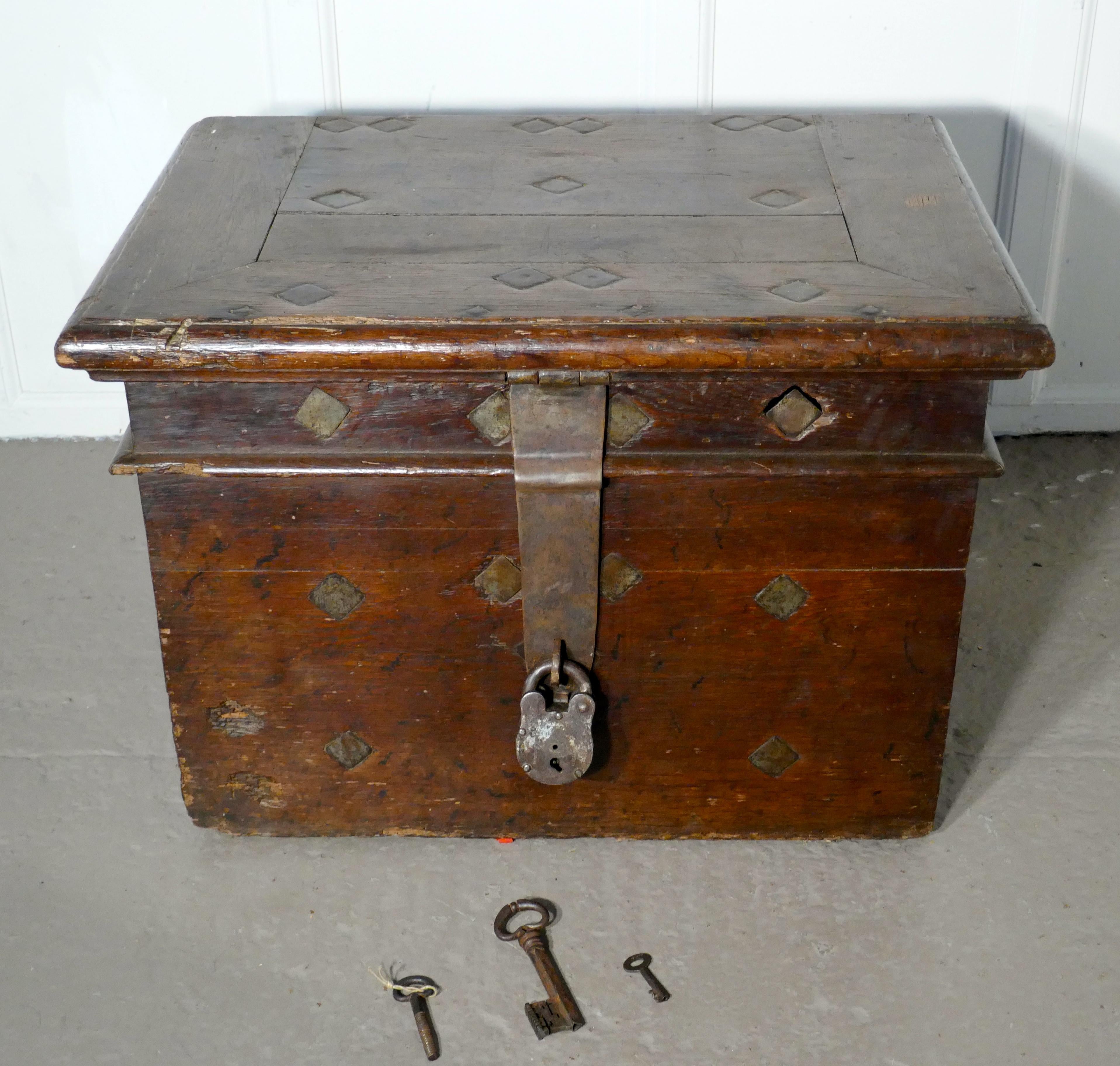 17th Century French Coffer, Oak Silver Treasure Chest, Strong Box

A Very Rare piece, this Oak Coffer was made in the 16th Century in 3” thick Oak, lined inside and strengthened through the wood with 1” square Iron Rods.
Needless to say the chest is