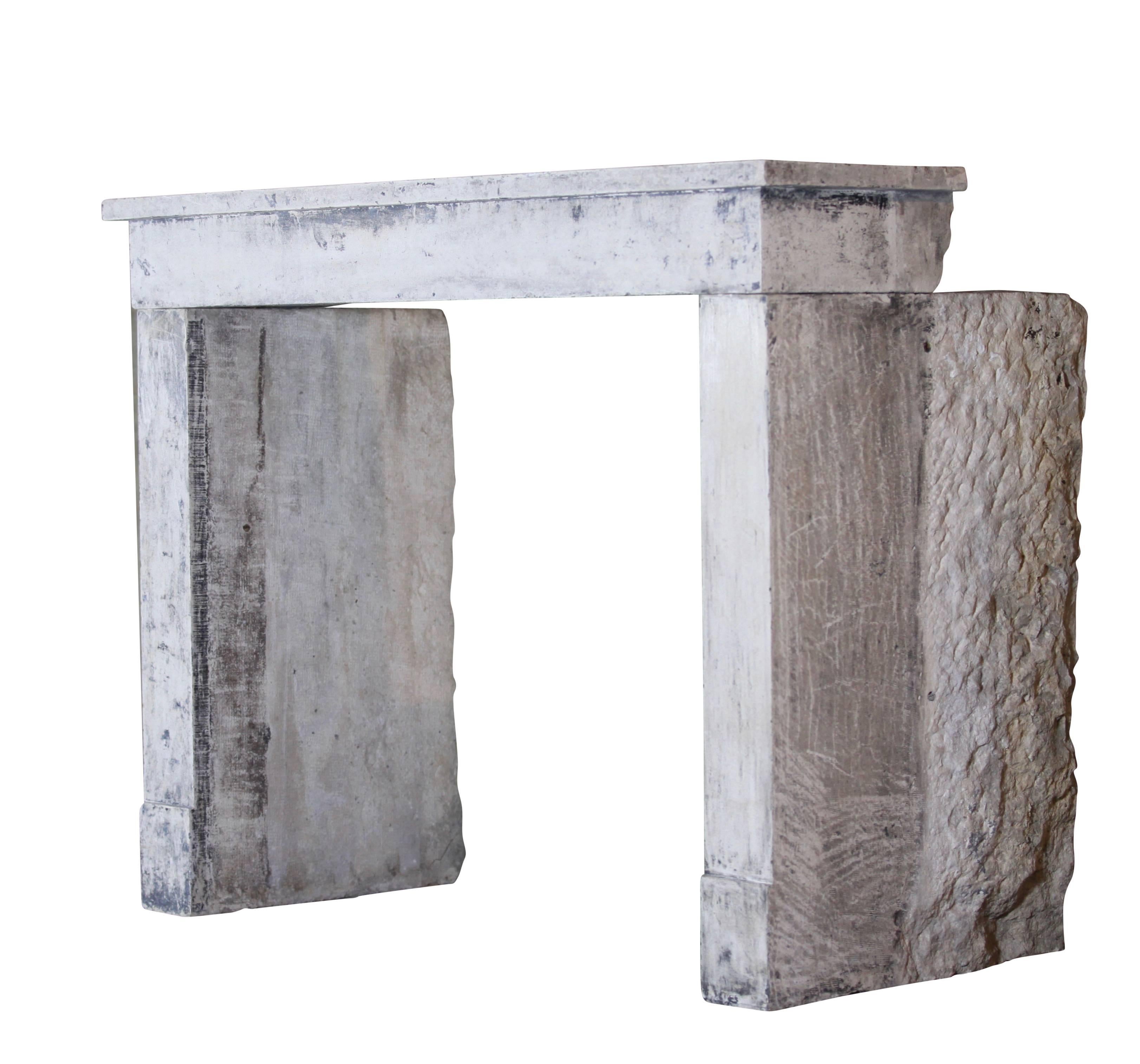 This small vintage fireplace surround in limestone has remains of the original patina. It is perfect for a country side house, a rustic room.
Measures: 
131 cm EW 51.57