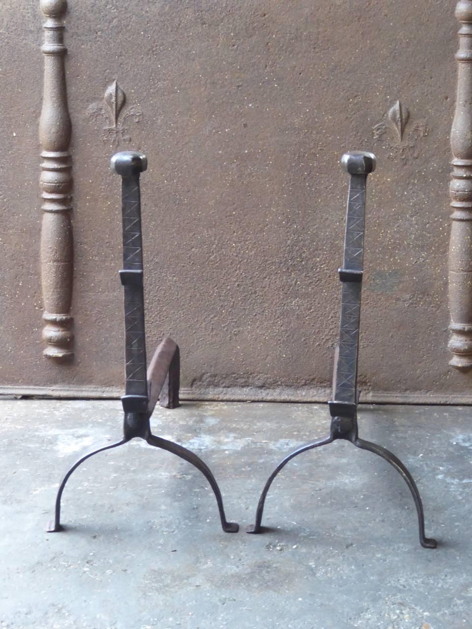 17th century French Gothic andirons made of wrought iron.

The condition is good.