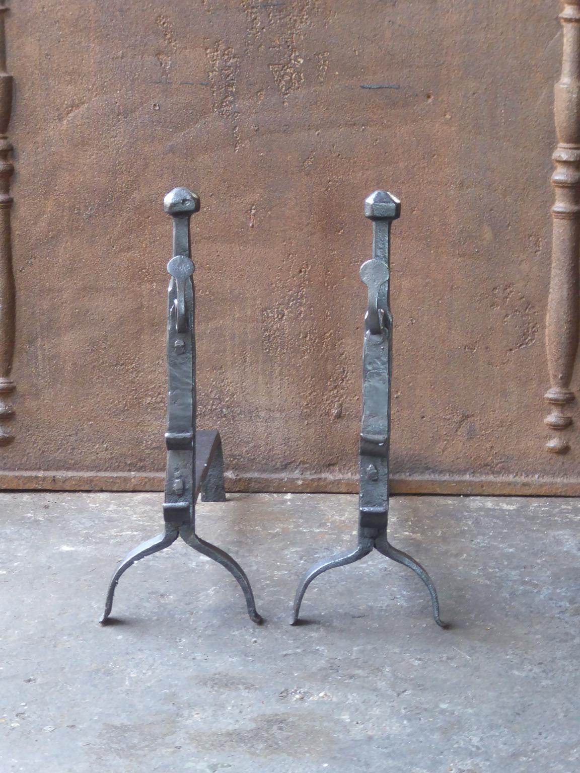 17th century French gothic andirons. The andirons are made of wrought iron. They have spit hooks to grill food.






  
   