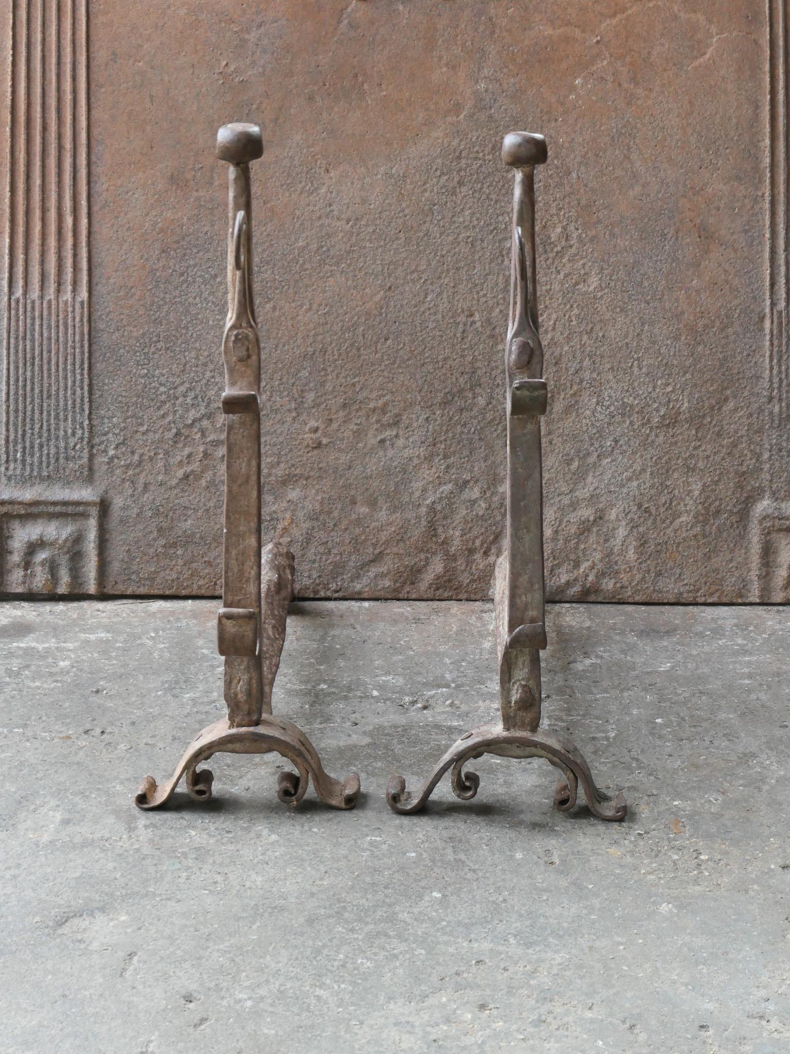 17th century Gothic Period andirons made of wrought iron. The andirons are in a good condition and are fit for use in the fireplace.