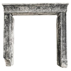 Antique 17th Century French Hand-Chiseled Stone Fireplace Mantel