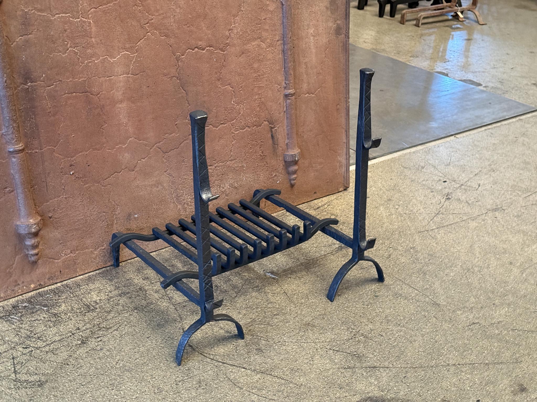 17th century French Louis XIII Period fireplace grate. Made of beautifully forged wrought iron andirons and a recently forged grate. The condition is good.