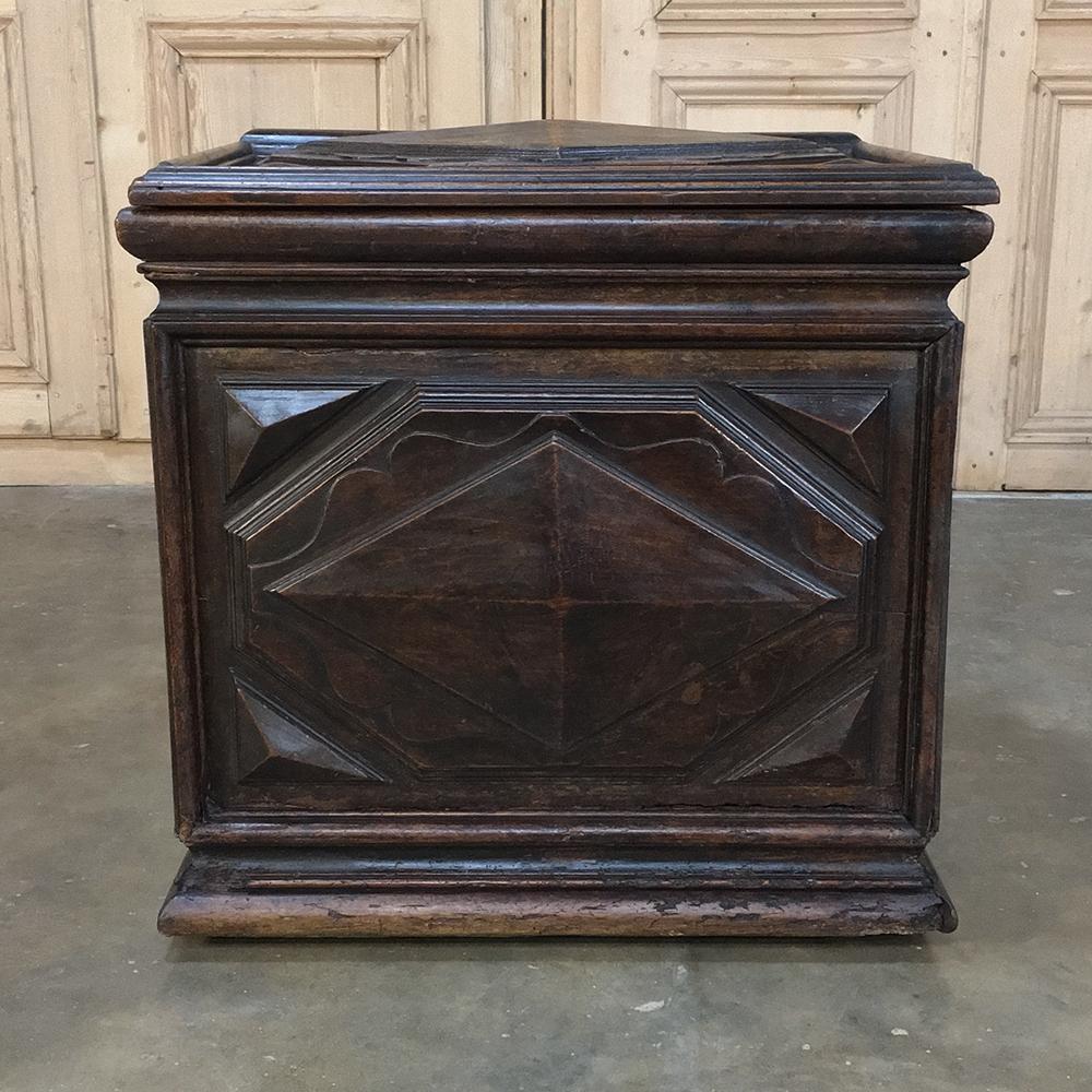 17th century French Louis XIII Petit Trunk was obviously meant for a cozy nook, and features unadorned pyramidal panels and a surprising amount of storage inside! Restorations have been expertly performed during the 19th century on the piece to