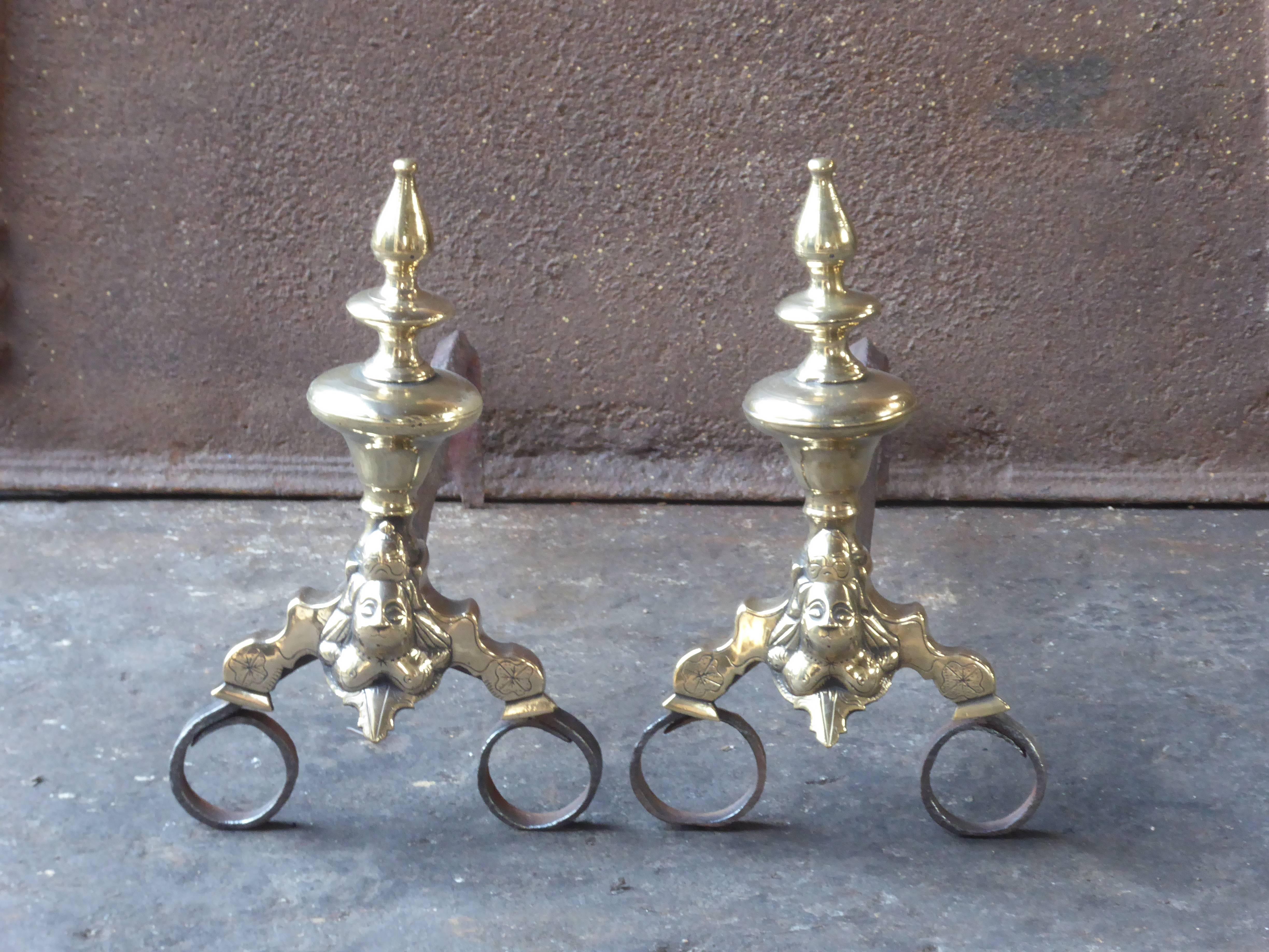 Beautiful 17th century French Louis XIV andirons made of bronze and wrought iron.

The condition of the andirons is good. They are fit for use in the fireplace.