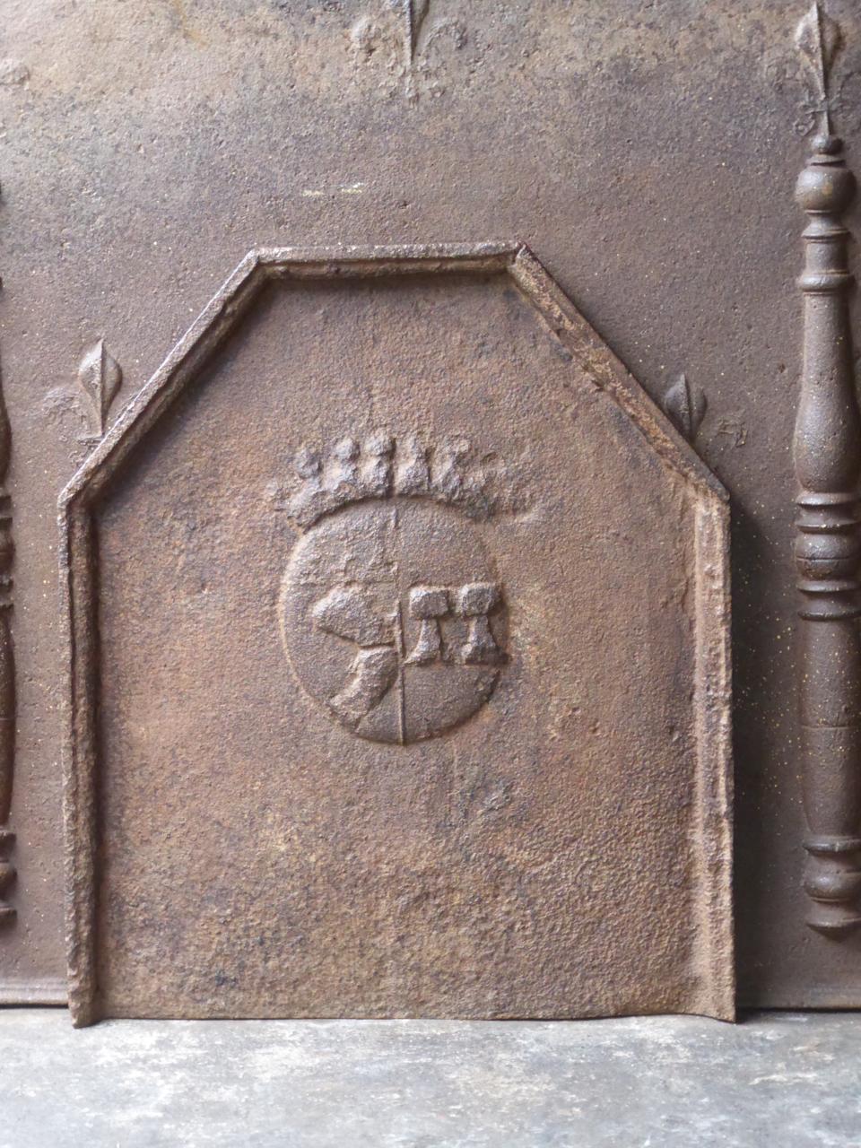 17th century French Louis XIV fireback with a coat of arms. The fireback has a natural brown patina. Upon request it can be made black.







 