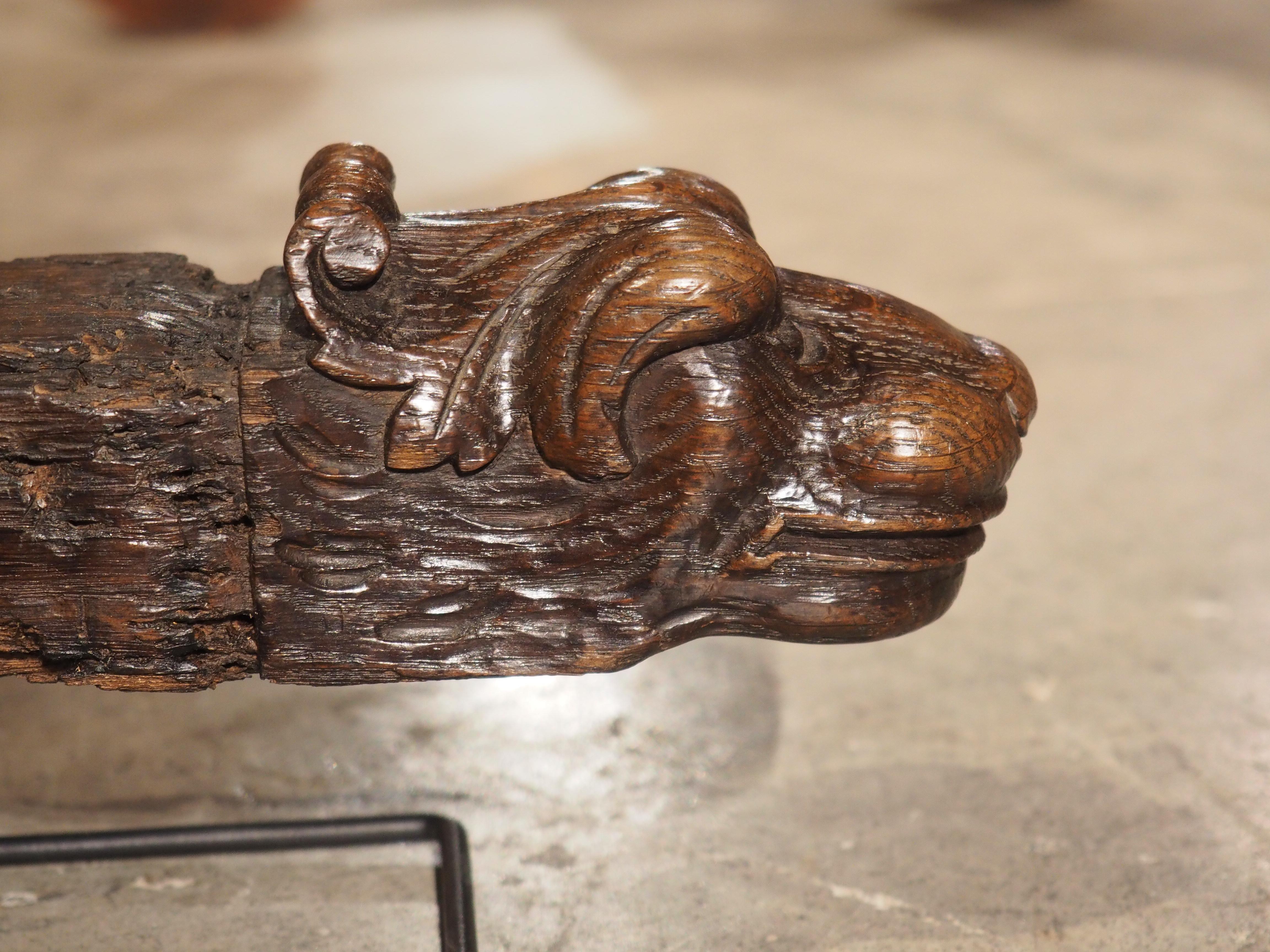 Hand-Carved 17th Century French Oak Lion Heads Sculpture on Iron Stand