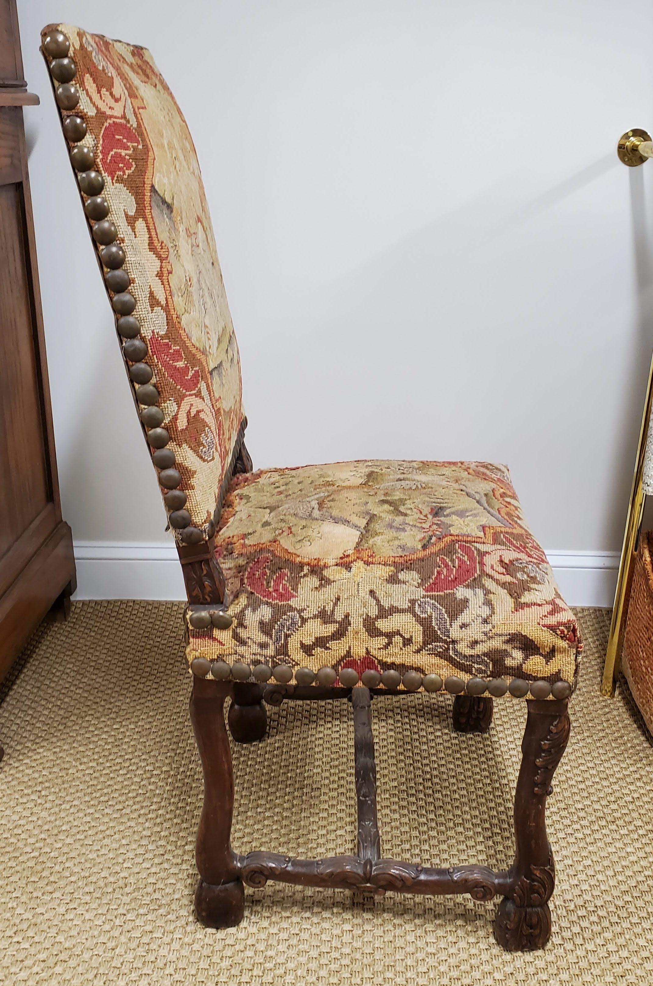 17th Century French Provincial Louis XIII period needlepoint & walnut side chair
Unusual 17th century French Provincial Louis XIII period side chair made of richly patinated Circassian walnut with a deep lustrous color. Intricate carved decoration