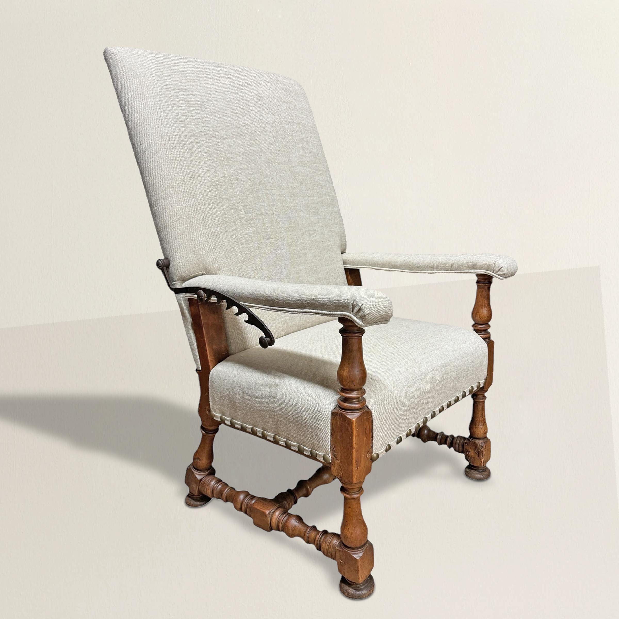 A rare and remarkable example of 17th-century French Baroque design, this ratchet chair is both sculptural and functional. Crafted from rich walnut, its turned legs and stretchers showcase the artistry of the period, with beautifully aged surfaces
