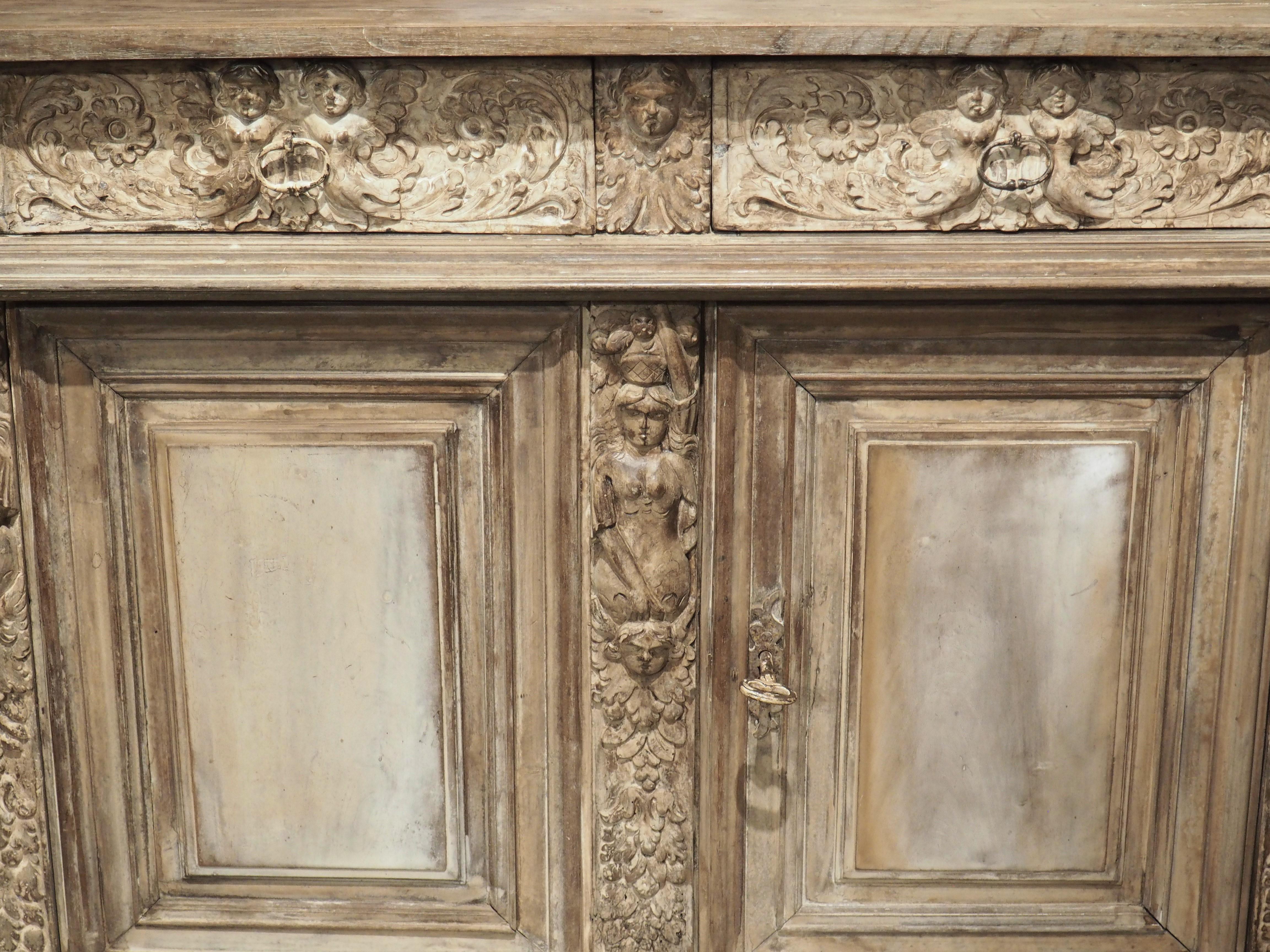 Hand-Carved 17th Century French Renaissance Buffet with Light Parcel Paint Finish For Sale