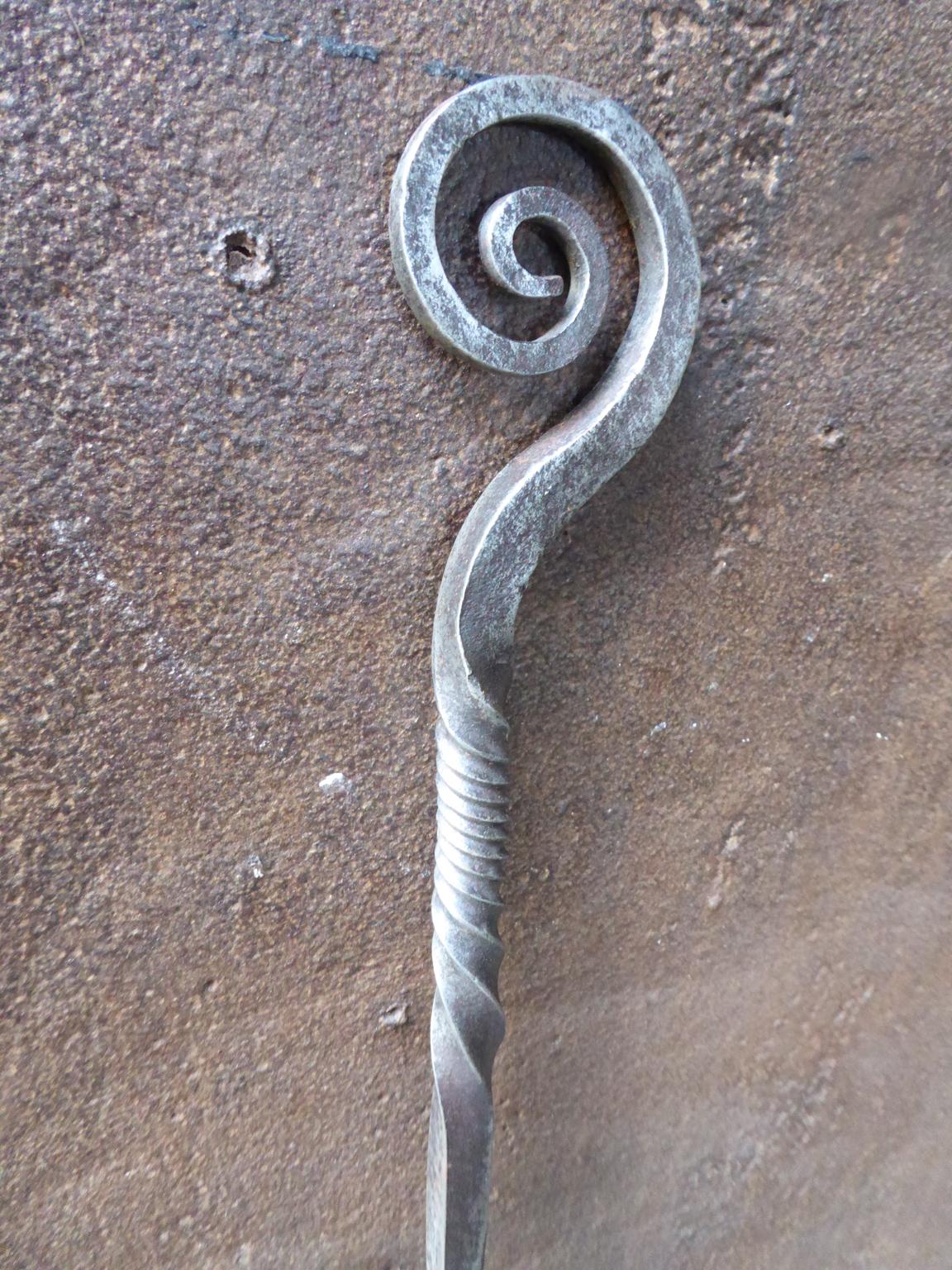 17th century French toasting fork made of polished steel. The forks were used to toast bread and meat in the fireplace.