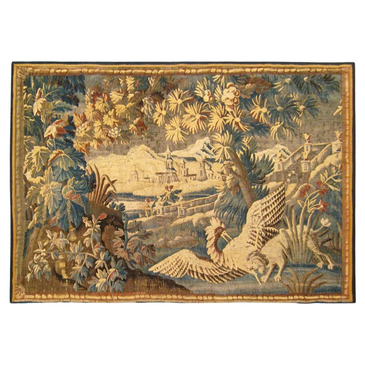 17th Century French Verdure Landscape Tapestry with a Dog Chasing an Exotic Bird For Sale