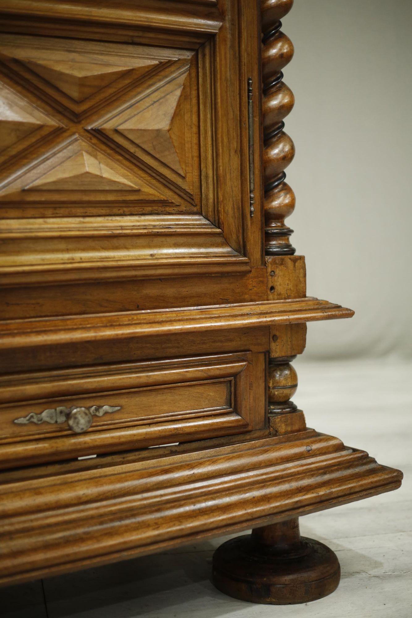 This is an exceptional 17th century walnut French armoire. The size of this piece is spectacular with a great original patina to the finish. Which makes it a talking point in any room. The oversized front feet is what drew me to it originally as I