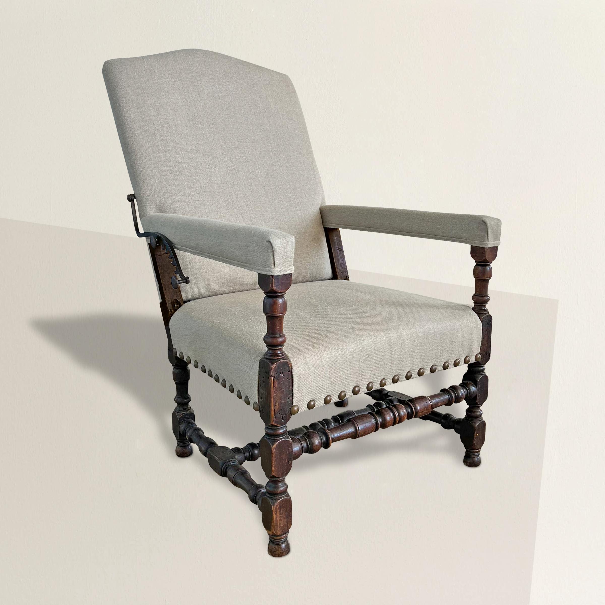 This 17th century French walnut ratchet chair is a magnificent embodiment of historical design ingenuity. Crafted with a frame comprised of wonderfully turned walnut styles, it represents the rustic elegance of French provincial furniture from this