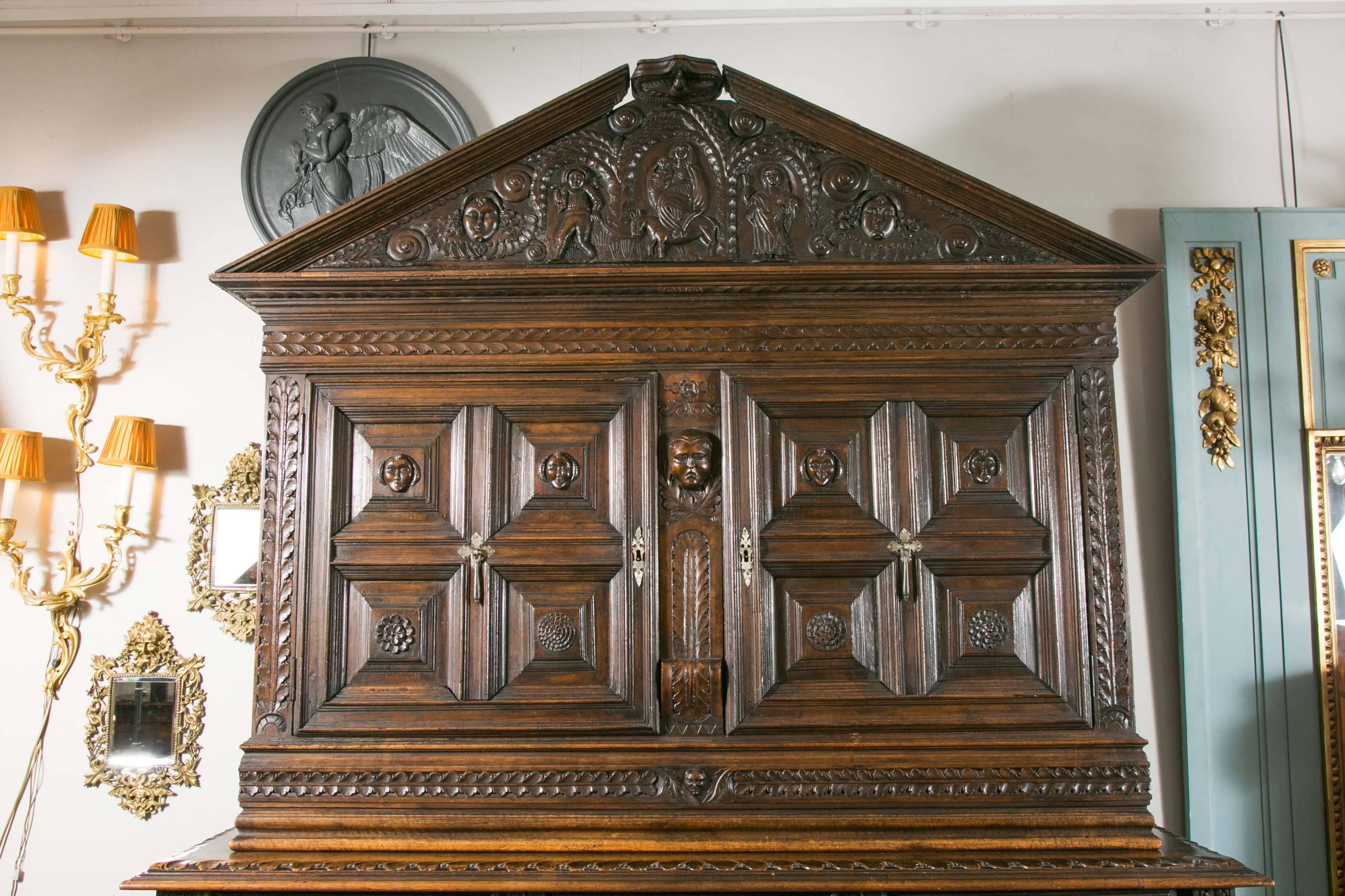 17th century furniture important supposedly from northern Italy, great decoration, carved walnut on all faces. Measures: H 2m53, W 1.76m, W 69cm.