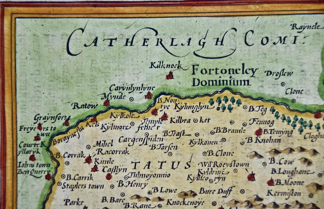 Engraved Southeastern Ireland: A 17th Century Hand Colored Map by Mercator and Hondius For Sale
