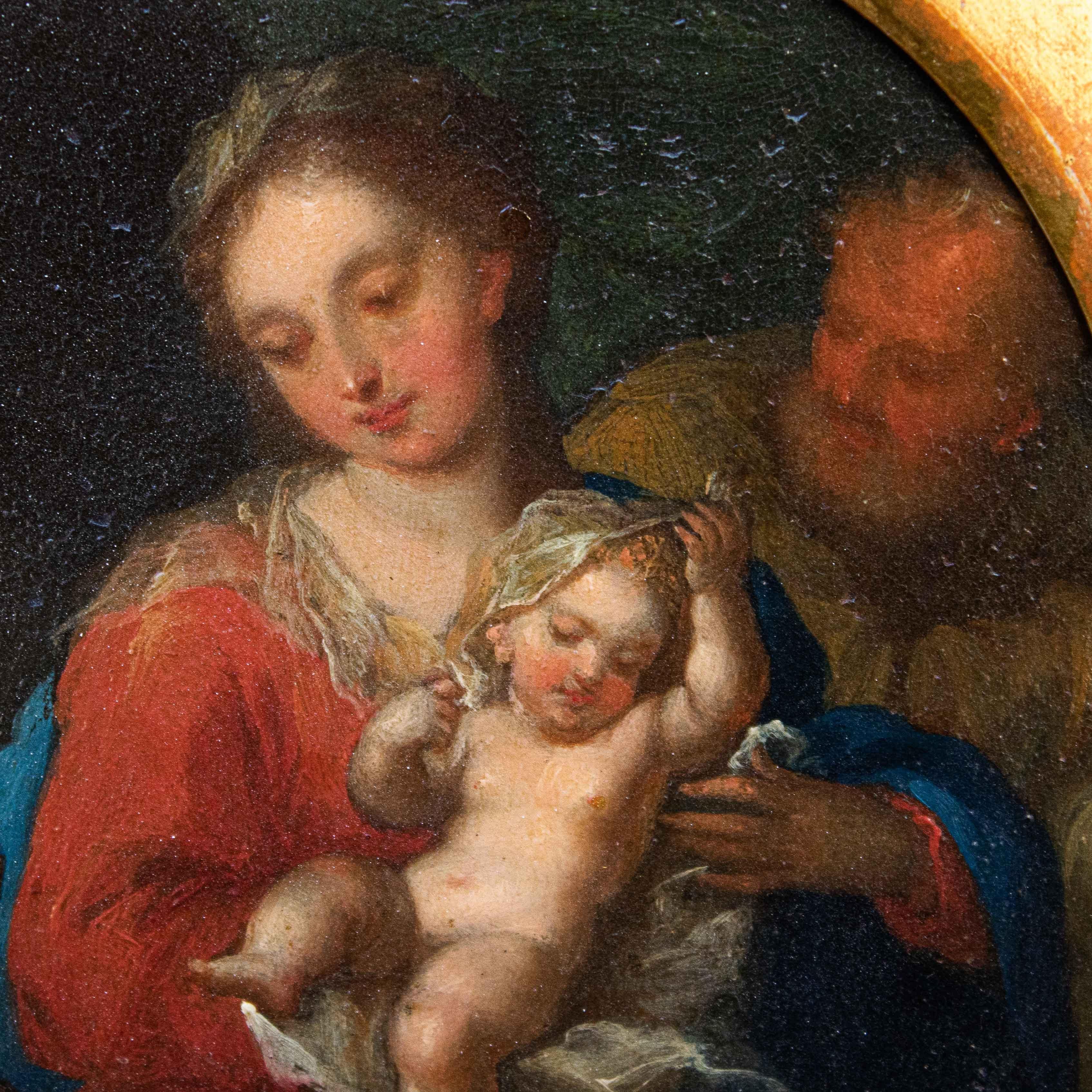 17th century, Italian school
Holy family with angel
Oil on copper, 16 x 14 cm - with frame 26 x 24 cm

The preferential use of a warm color range, with almost earthy tones, gives this rummy a sense of suspended grace. There is a canonical Holy