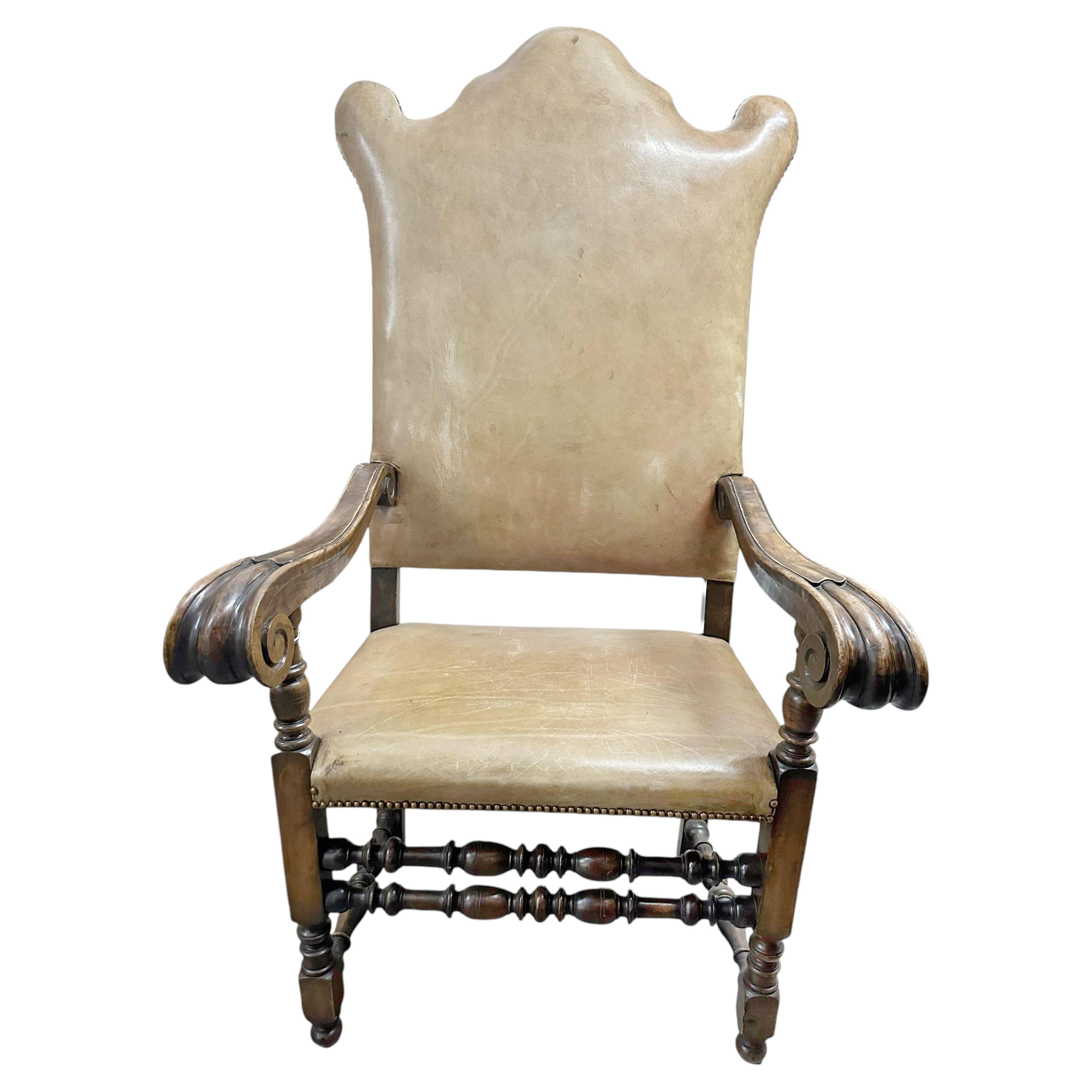17th Century Iberian Baroque Walnut Armchair, Leather Upholstery with Brass Nail For Sale