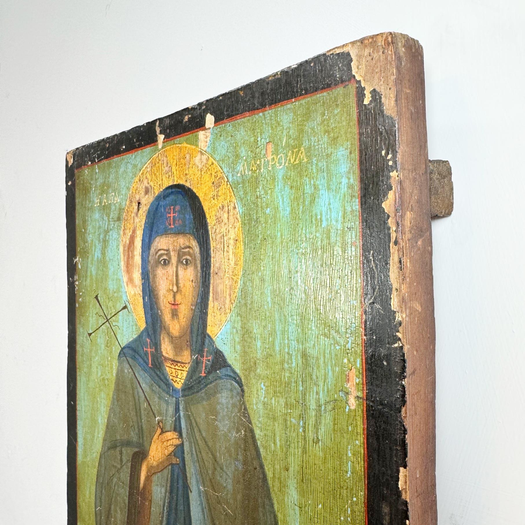 Hand-Painted 17th Century Icon on Board of Saint Matrona For Sale