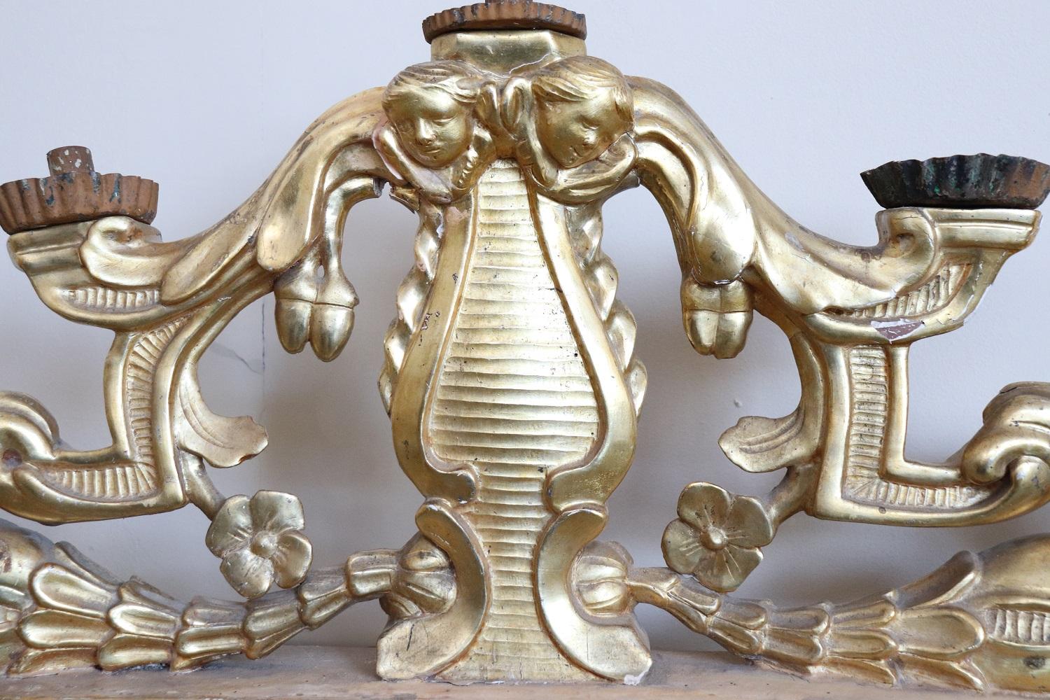Late 17th Century 17th Century Italian Baroque Carved and Gilded Wood Pair of Antique Candelabrum For Sale