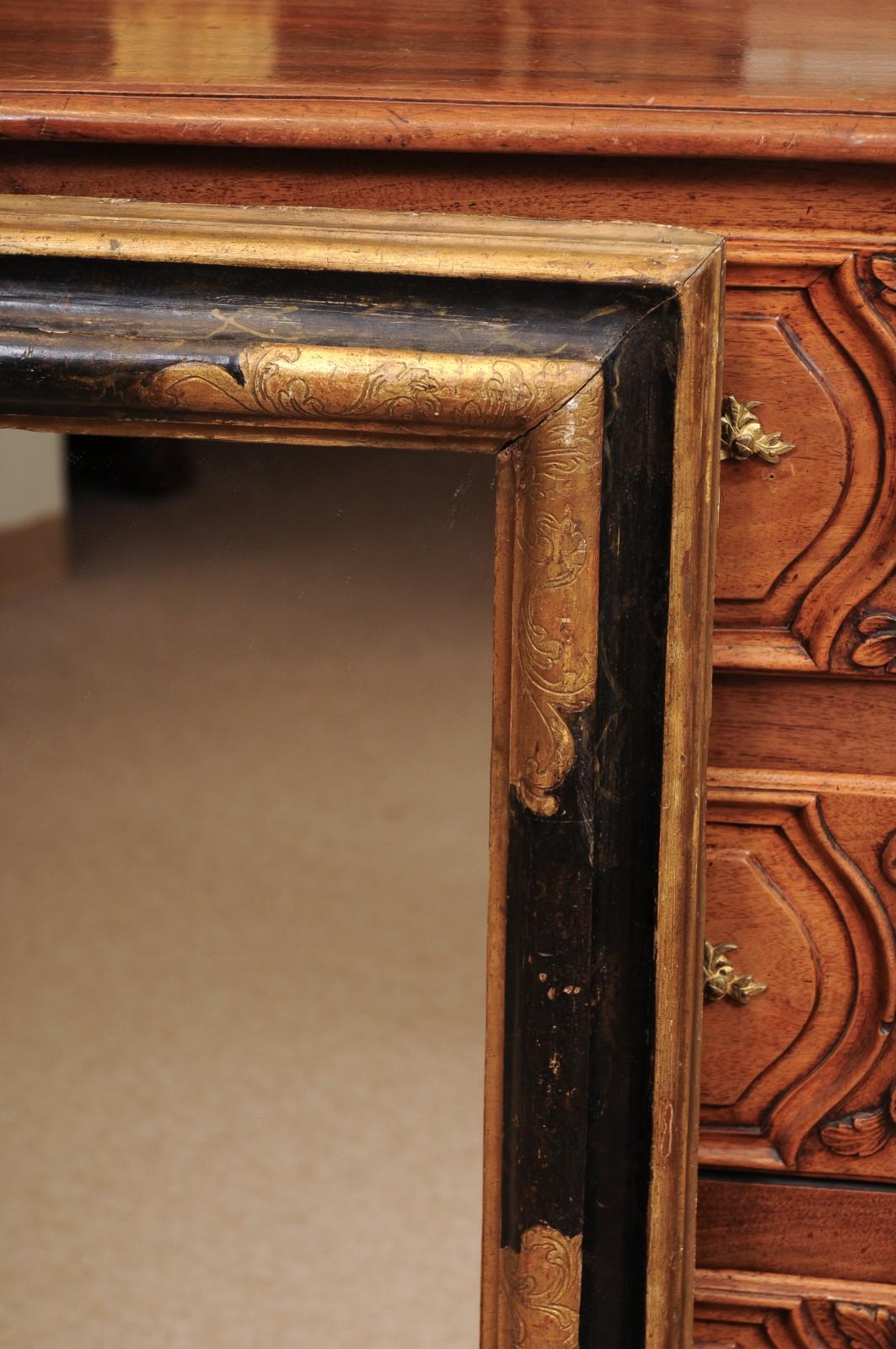 Miroir italien du 17e siècle en bois doré ébonisé et parcellaire en vente 2